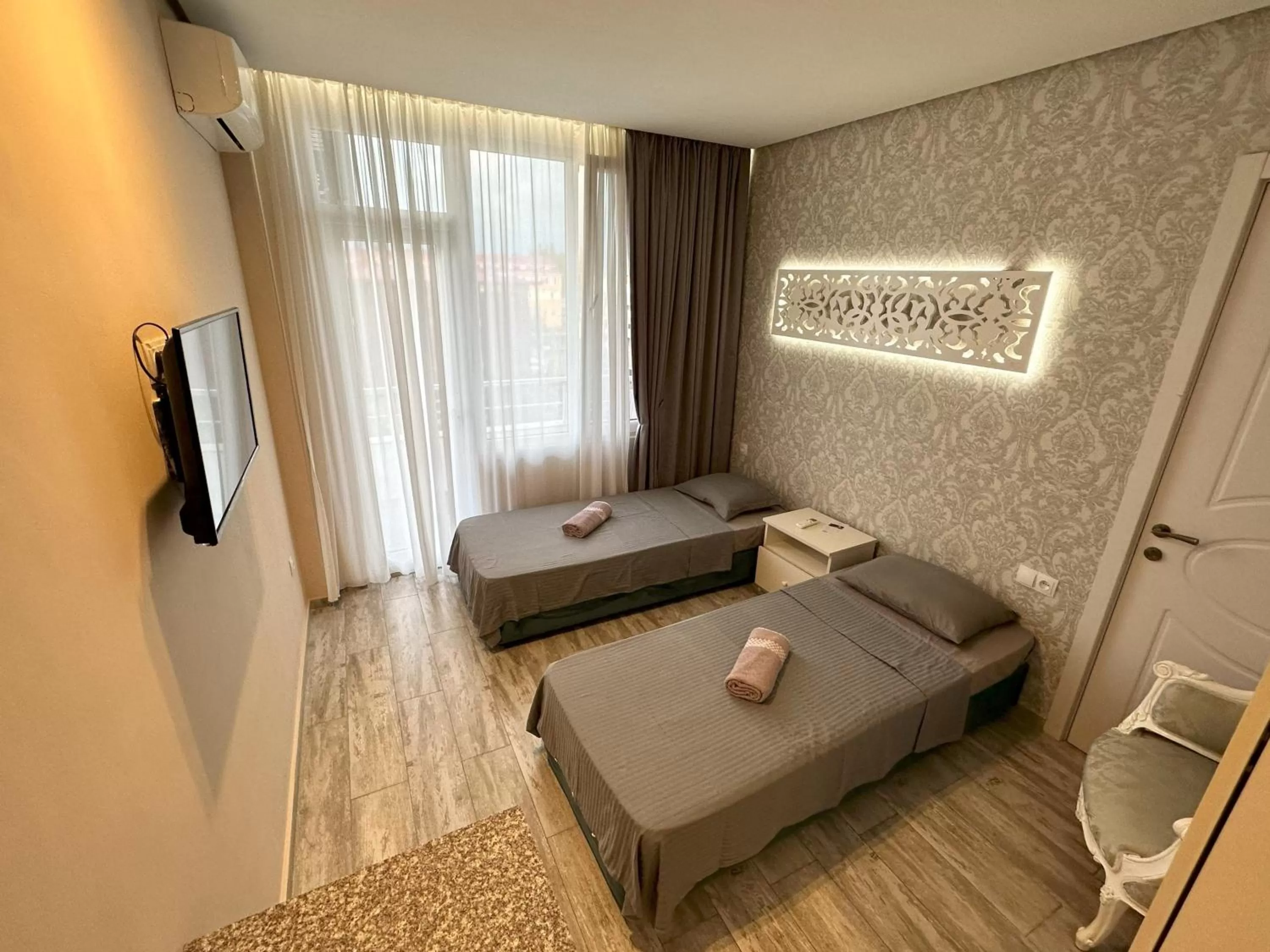 Photo of the whole room, Bed in National+