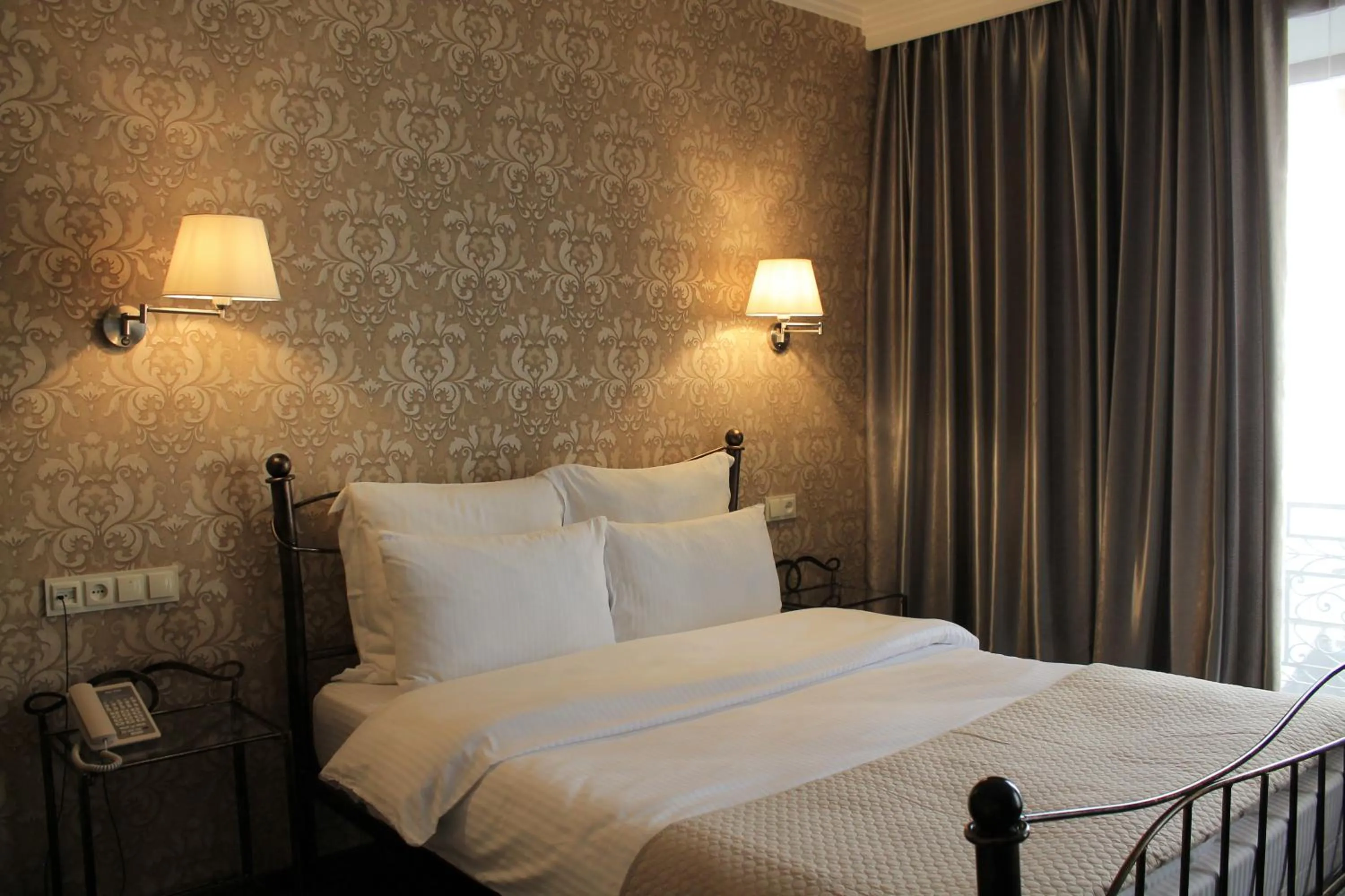 Bed in Redline Hotel