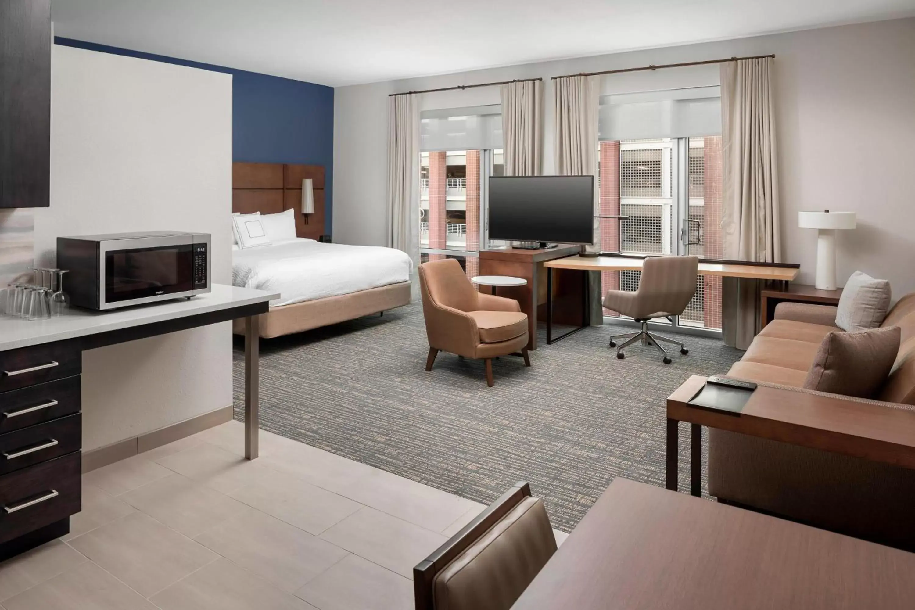 Photo of the whole room, TV/Entertainment Center in Residence Inn by Marriott Greenville Downtown