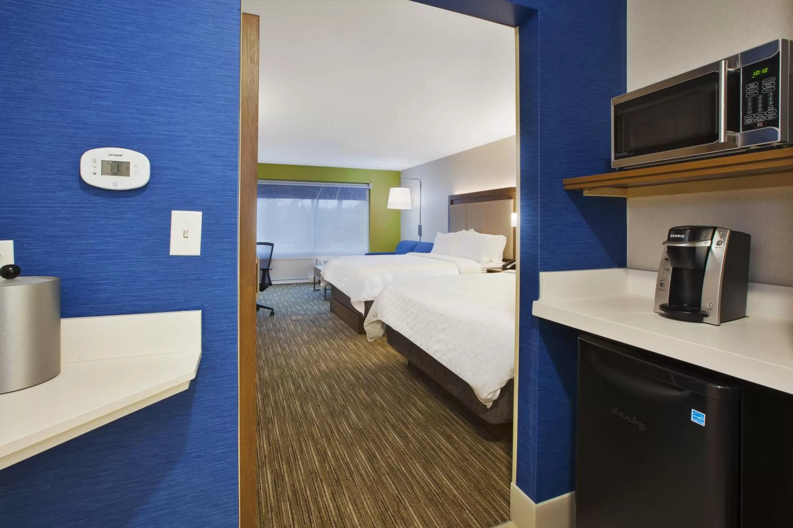 Photo of the whole room, Bed in Holiday Inn Express & Suites Grand Rapids Airport North by IHG