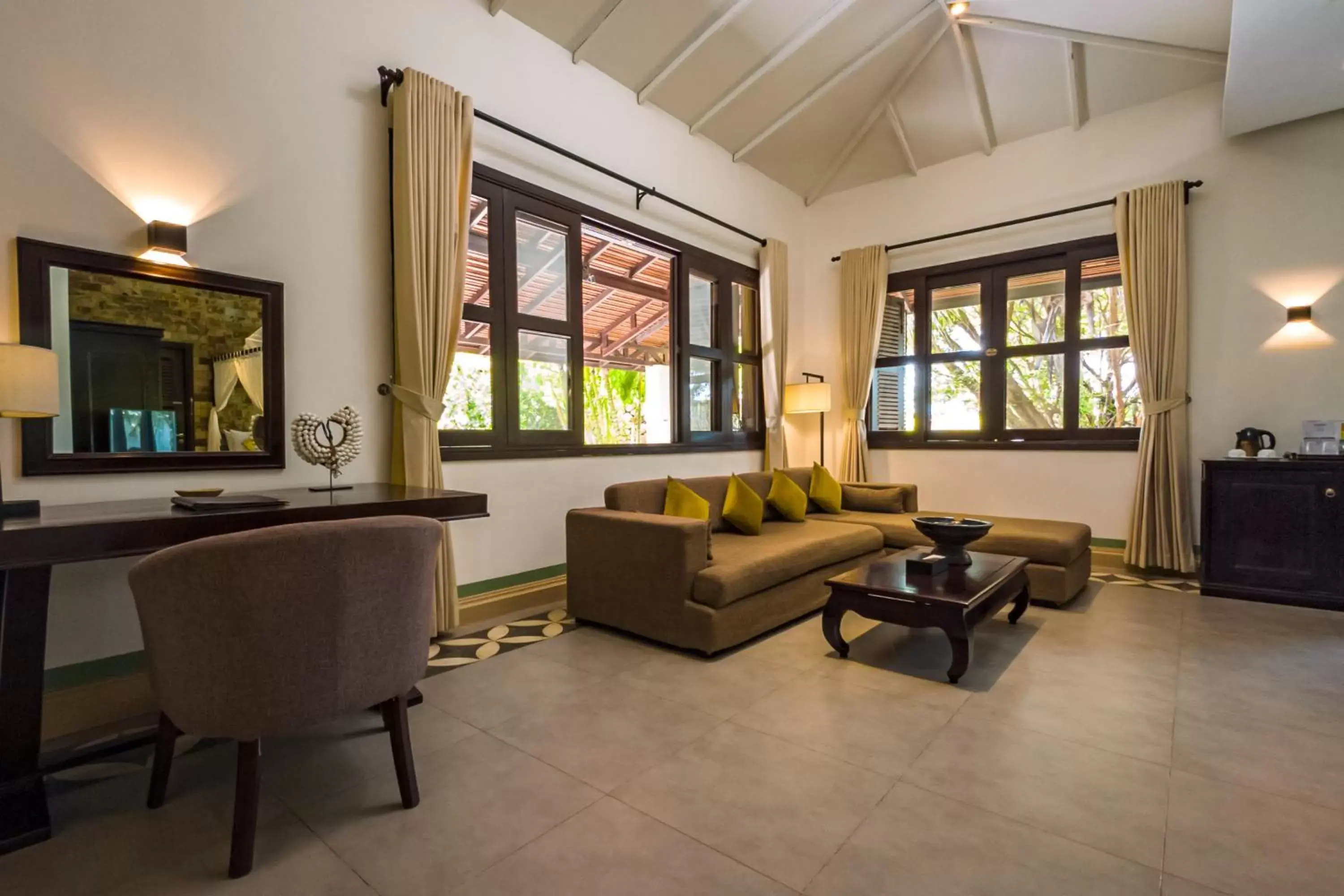 Living room in Samanea Beach Resort & Spa Living room in Samanea Beach Resort & Spa