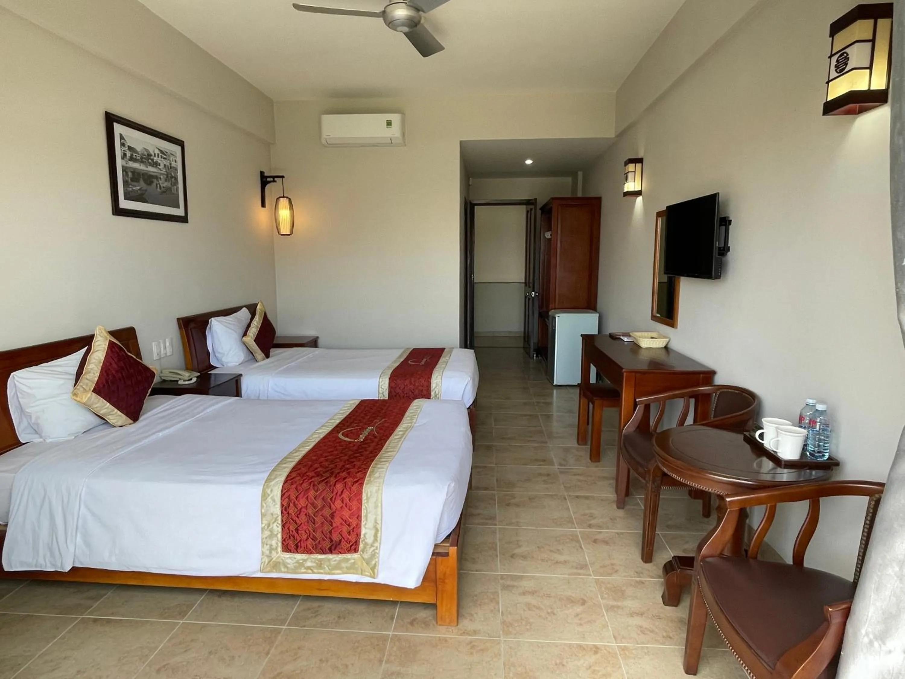 Bed in Sunshine Hoian Hotel