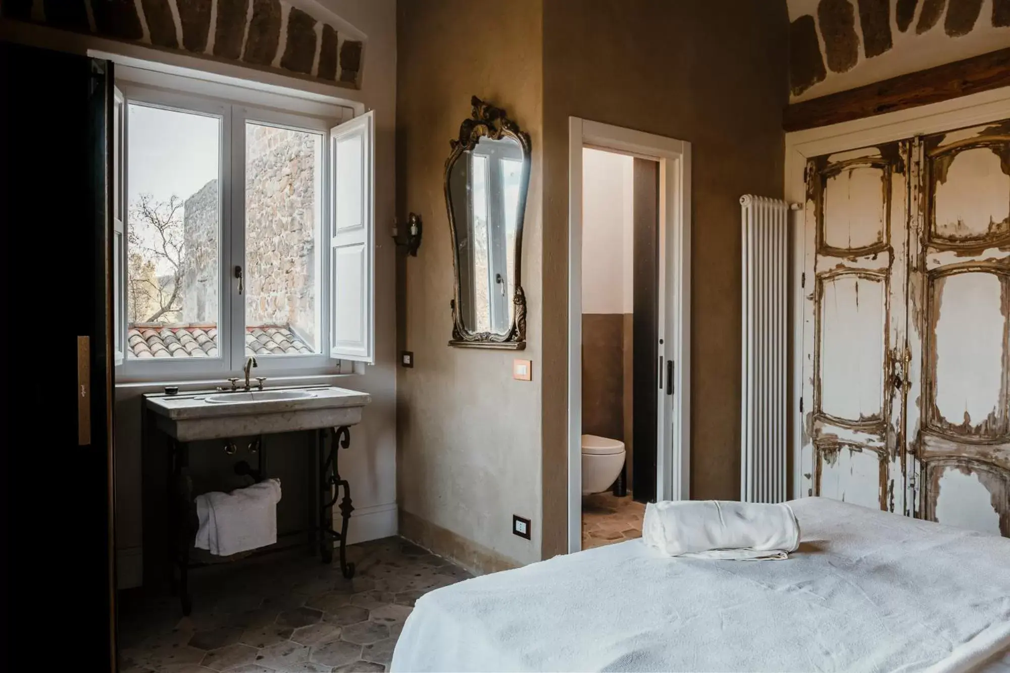 Bed, Bathroom in La pagliera