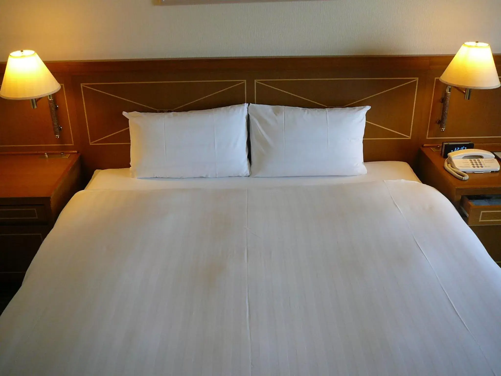 Bed in HOTEL GRAND HILLS SHIZUOKA