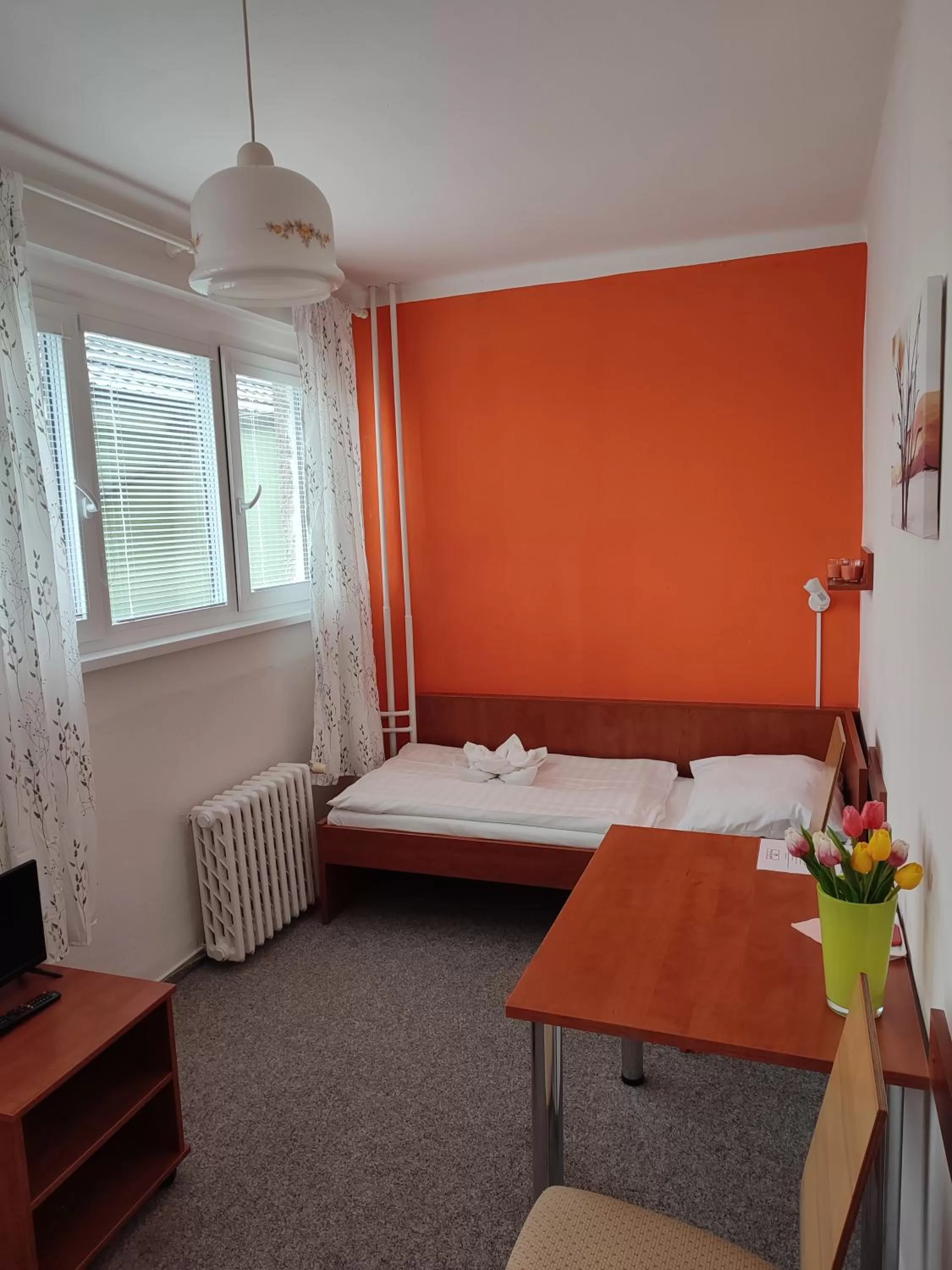 Bed in BEST Hotel Garni