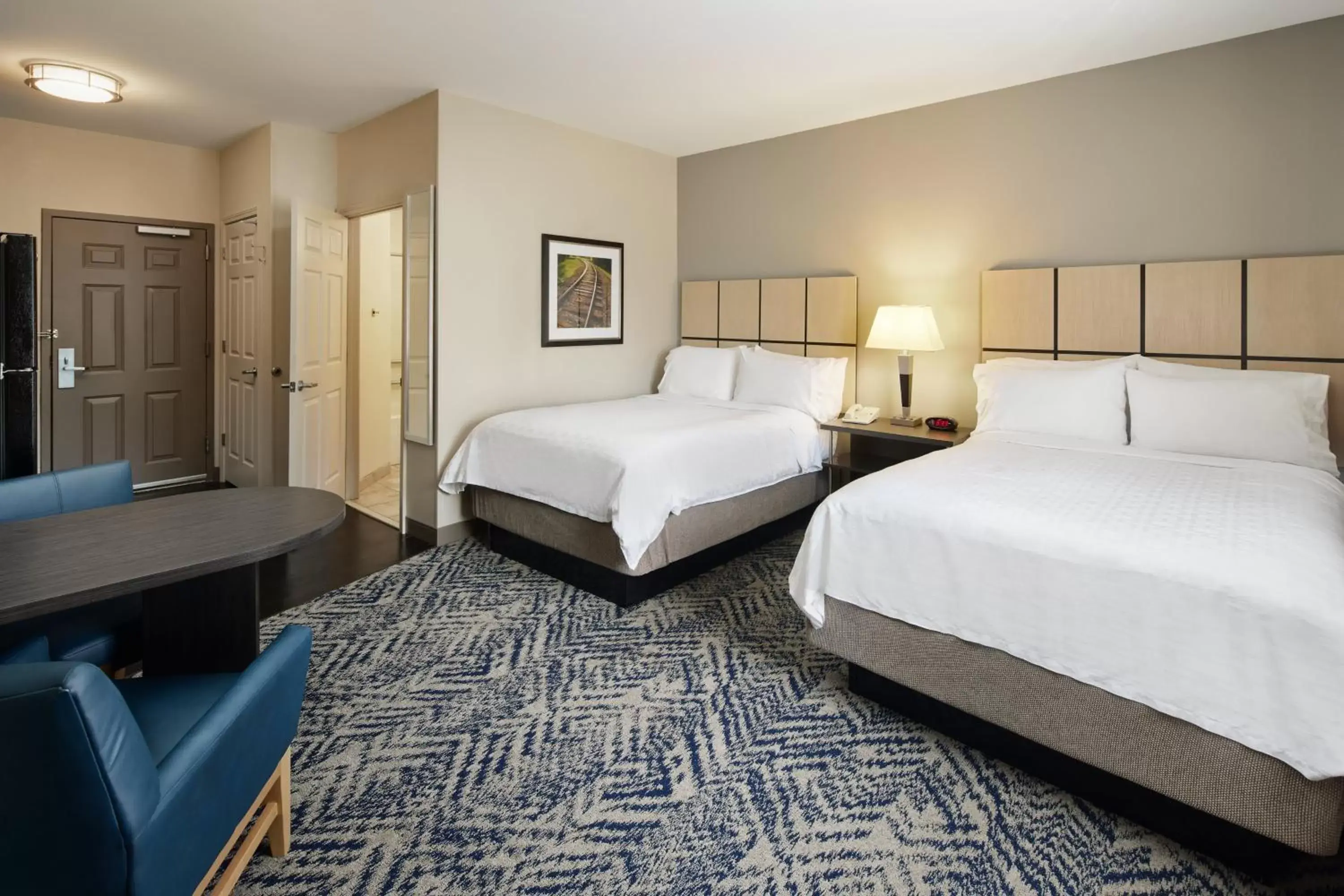Photo of the whole room, Bed in Candlewood Suites I-26 @ Northwoods Mall, an IHG Hotel