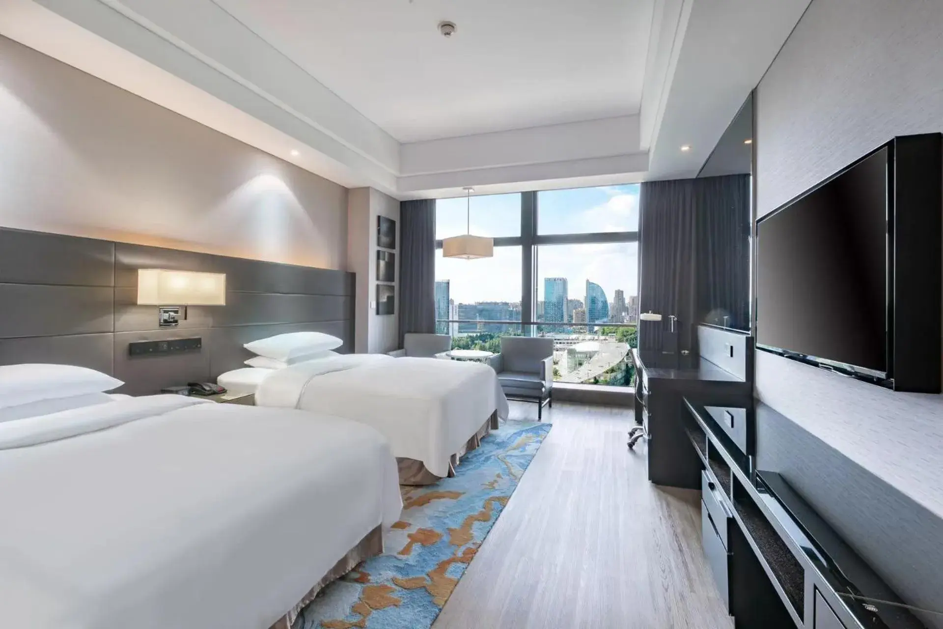 Bed in Renaissance Guiyang Hotel