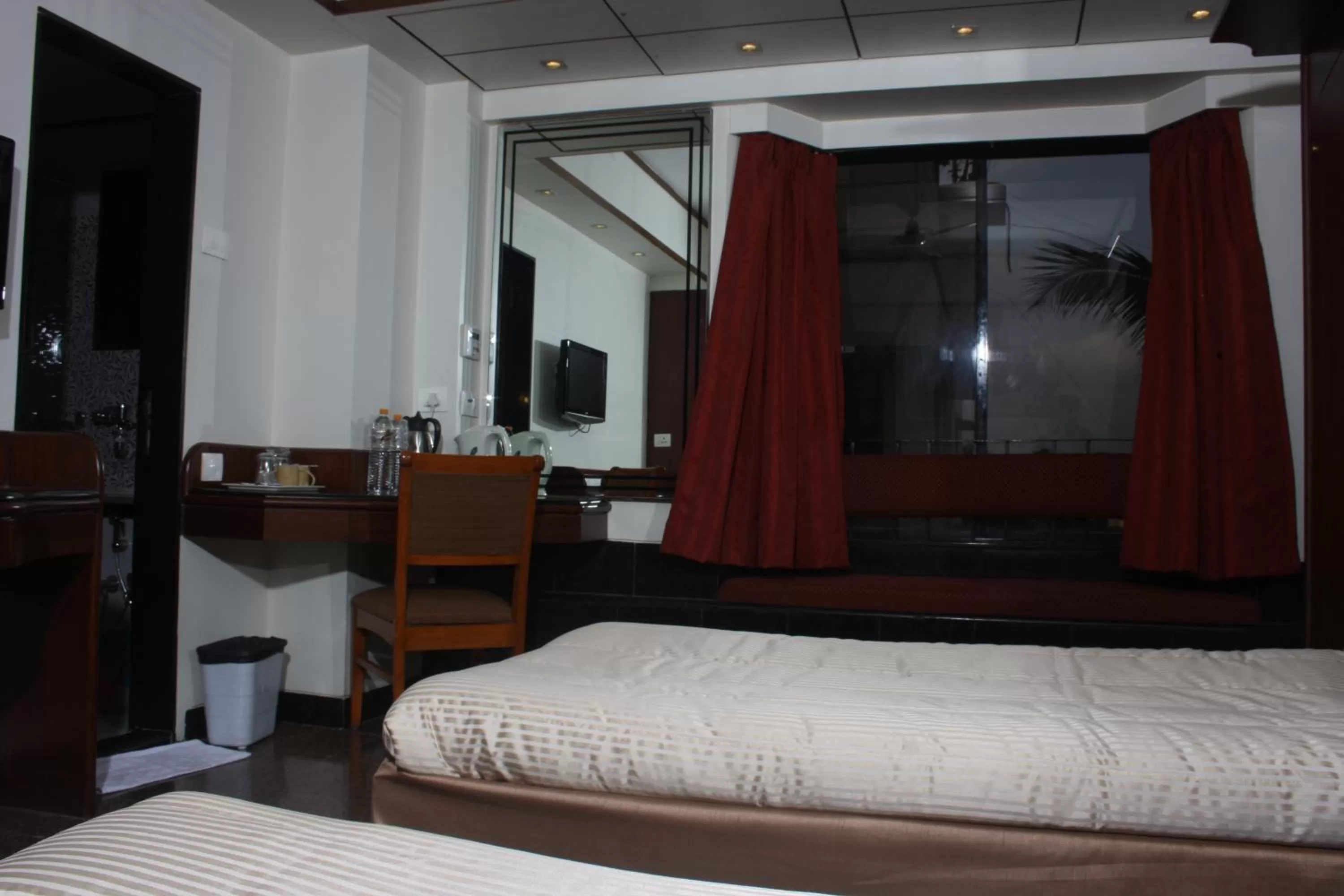 Photo of the whole room, Bed in Hotel Karl Residency
