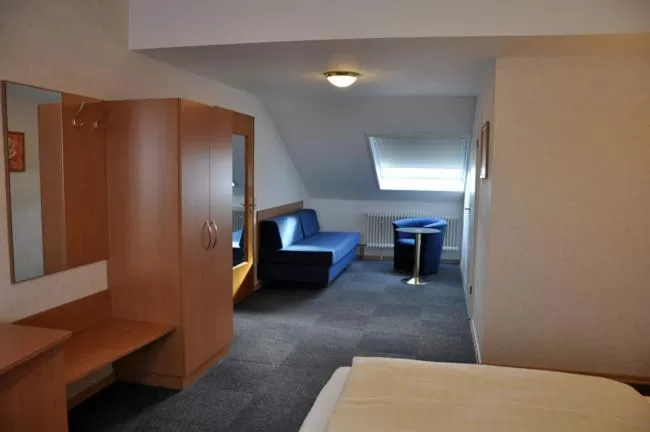 Living room, Bed in Hotel Bürgerhof