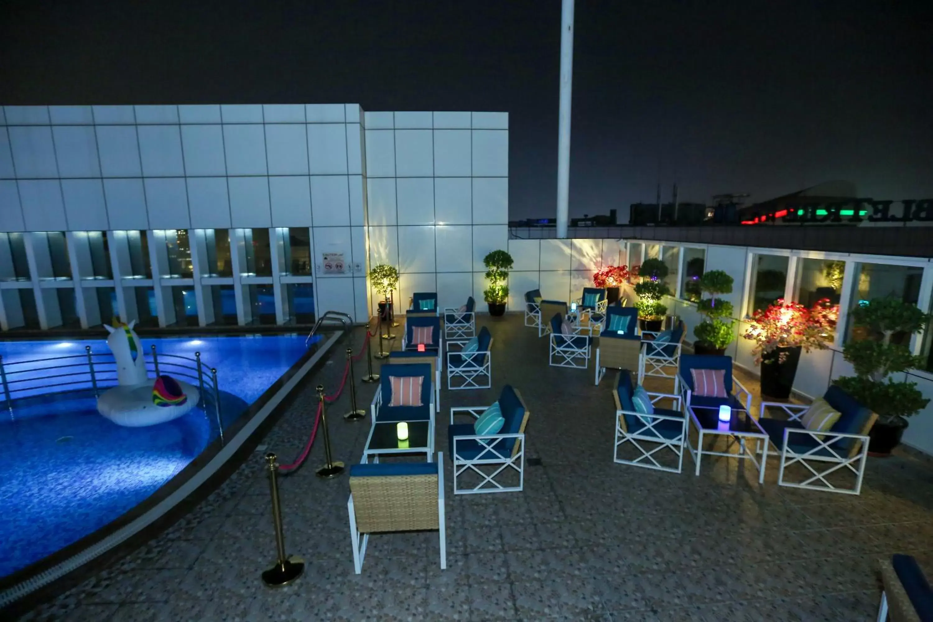 Lounge or bar, Pool View in Ivory Grand Hotel Apartments
