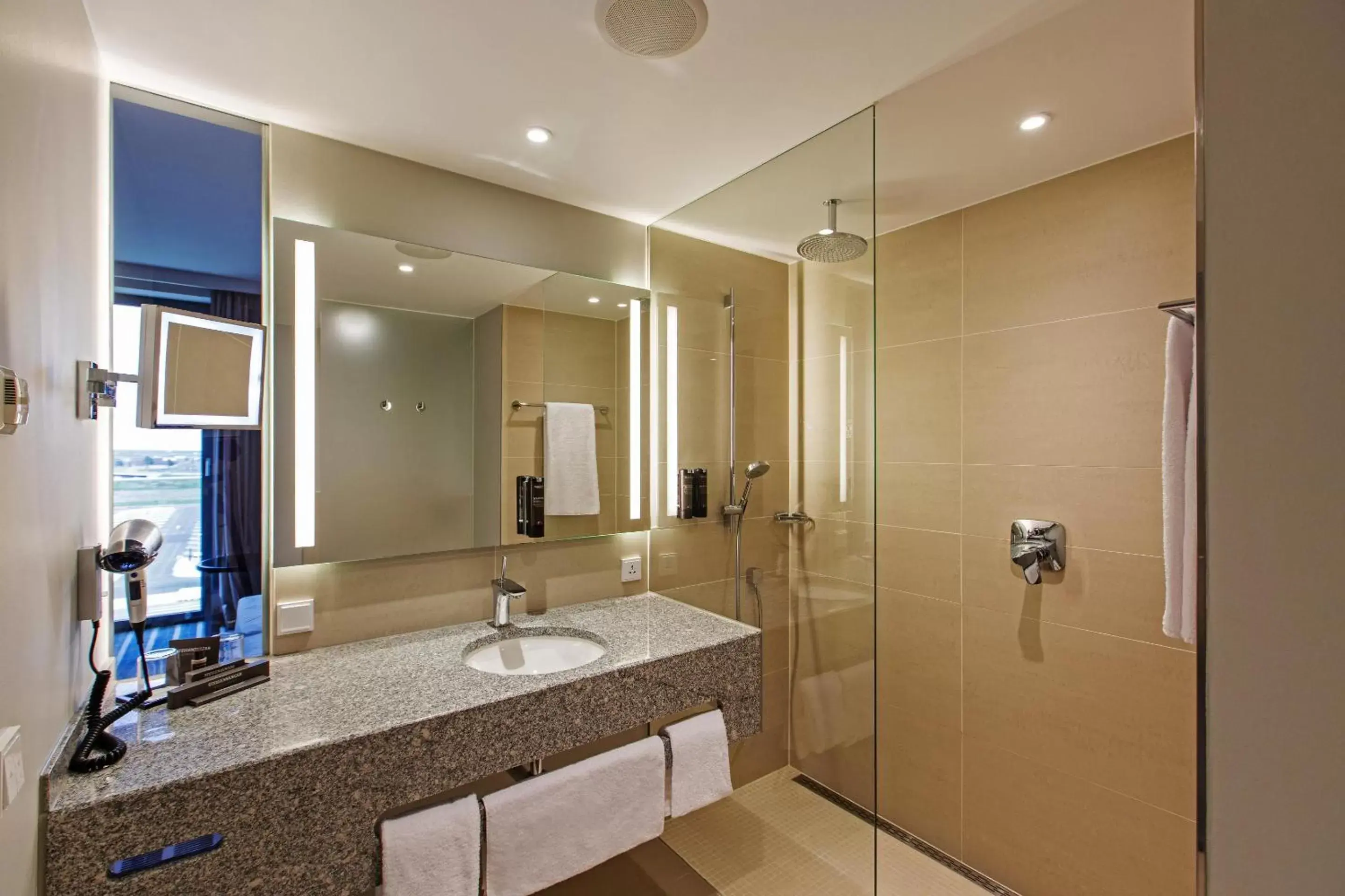 Shower, Bathroom in Steigenberger Airport Hotel Berlin