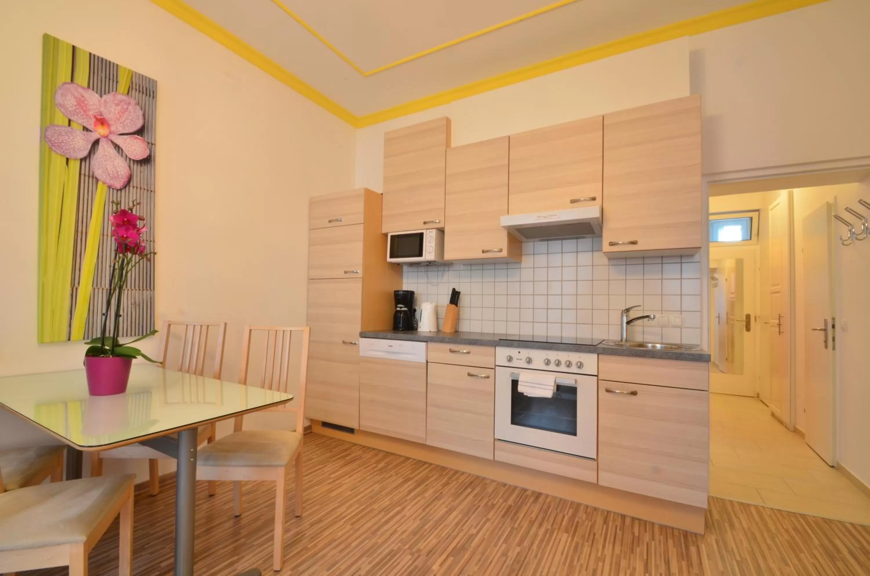 Kitchen or kitchenette in AJO Apartments - Messe City Flat - Self-Check-in