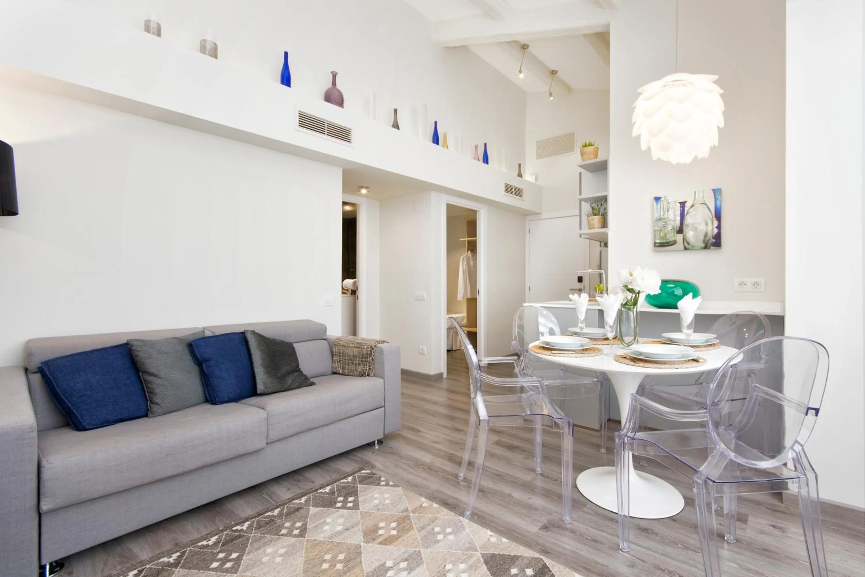 Seating area in Eixample Building Apartments by Mercedes Heritage