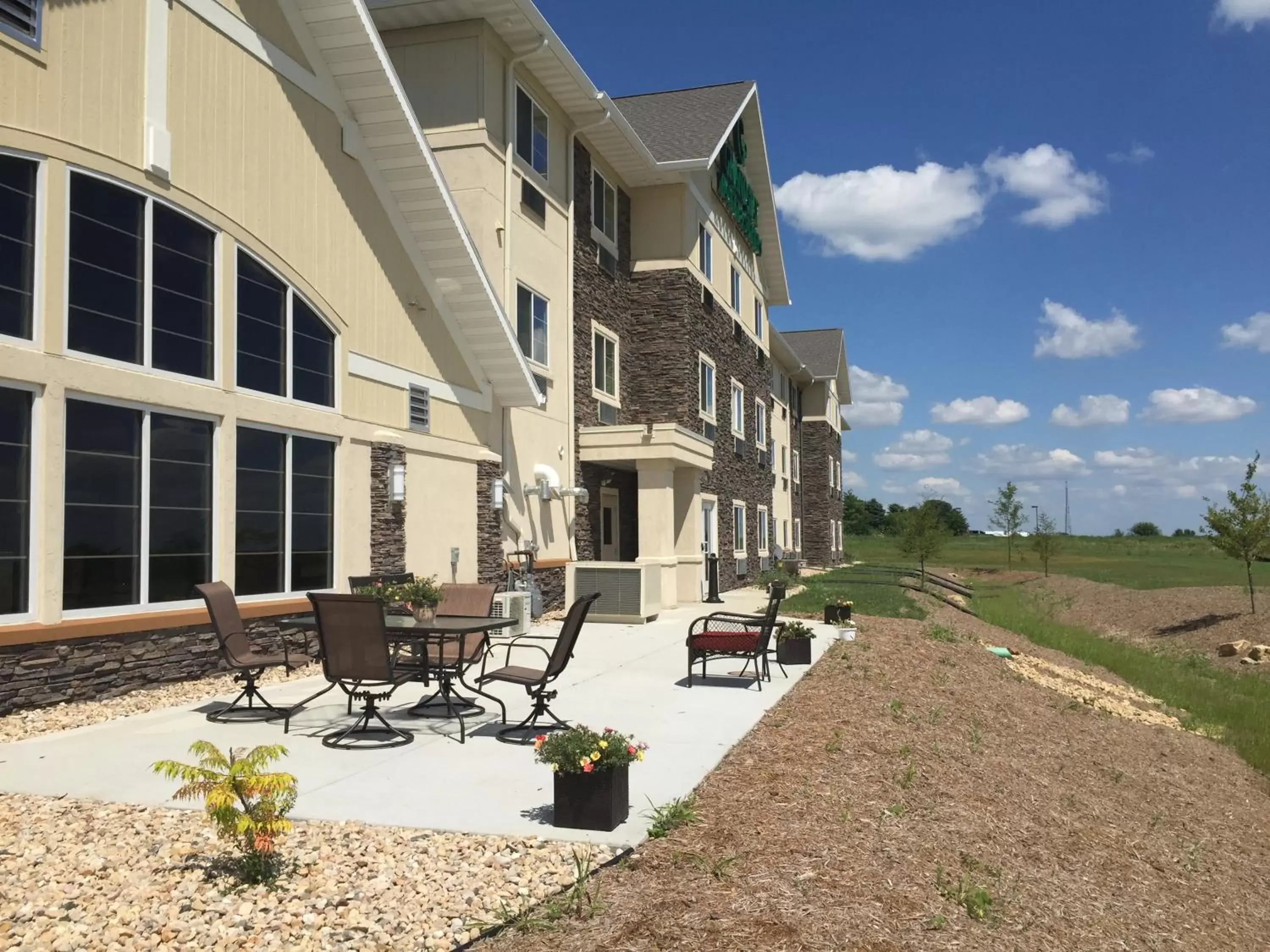 Patio, Property Building in Grandstay Hotel & Suites Mount Horeb - Madison