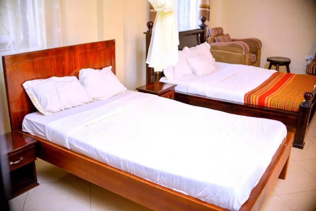 Bed in Acactus Hotel