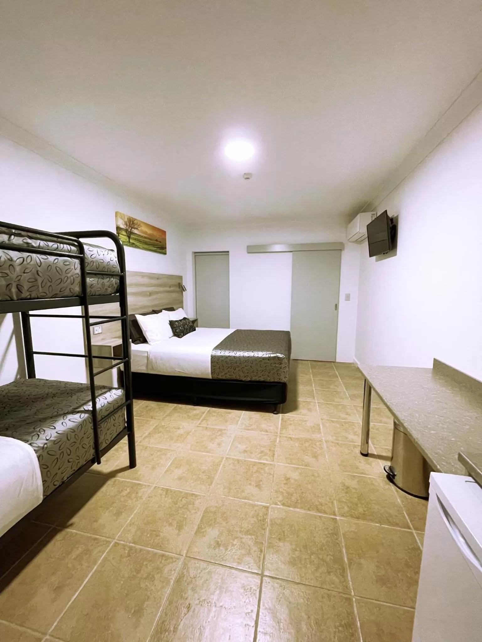 Bed in Childers Oasis Motel