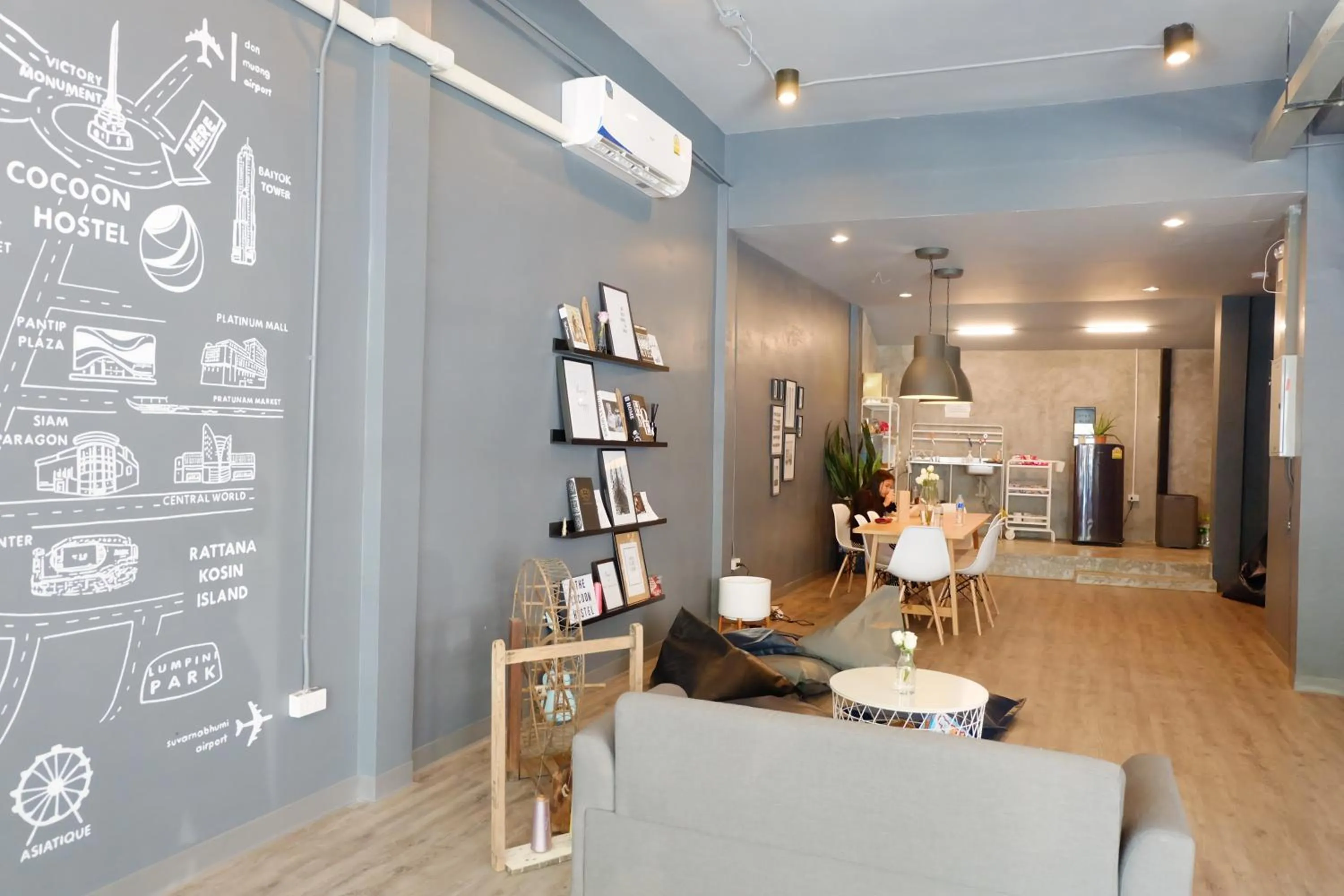 Communal lounge/ TV room in The Cocoon Hostel