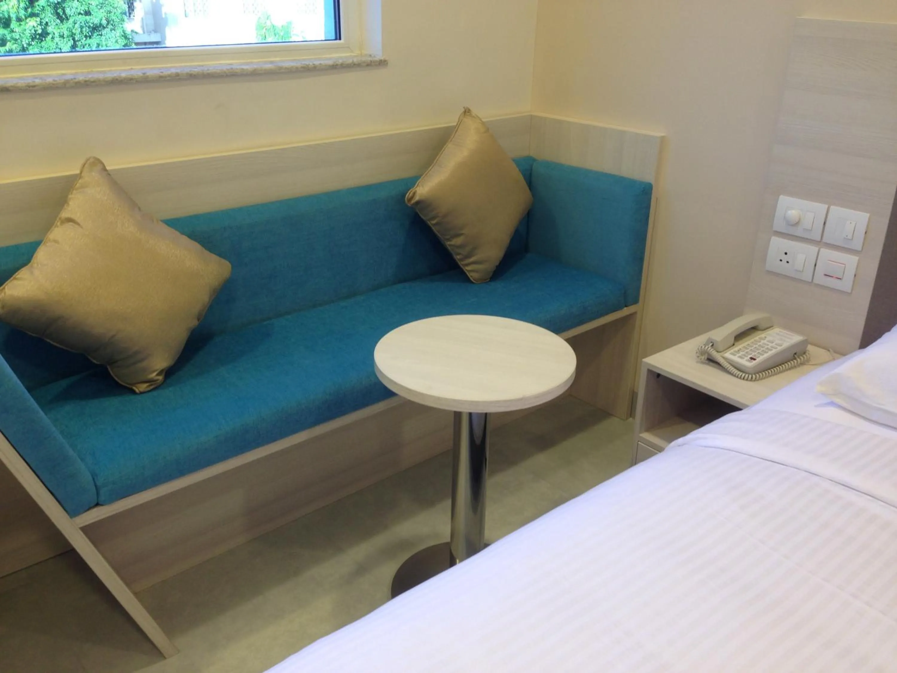 Seating area, Bed in Ginger Bhubaneshwar