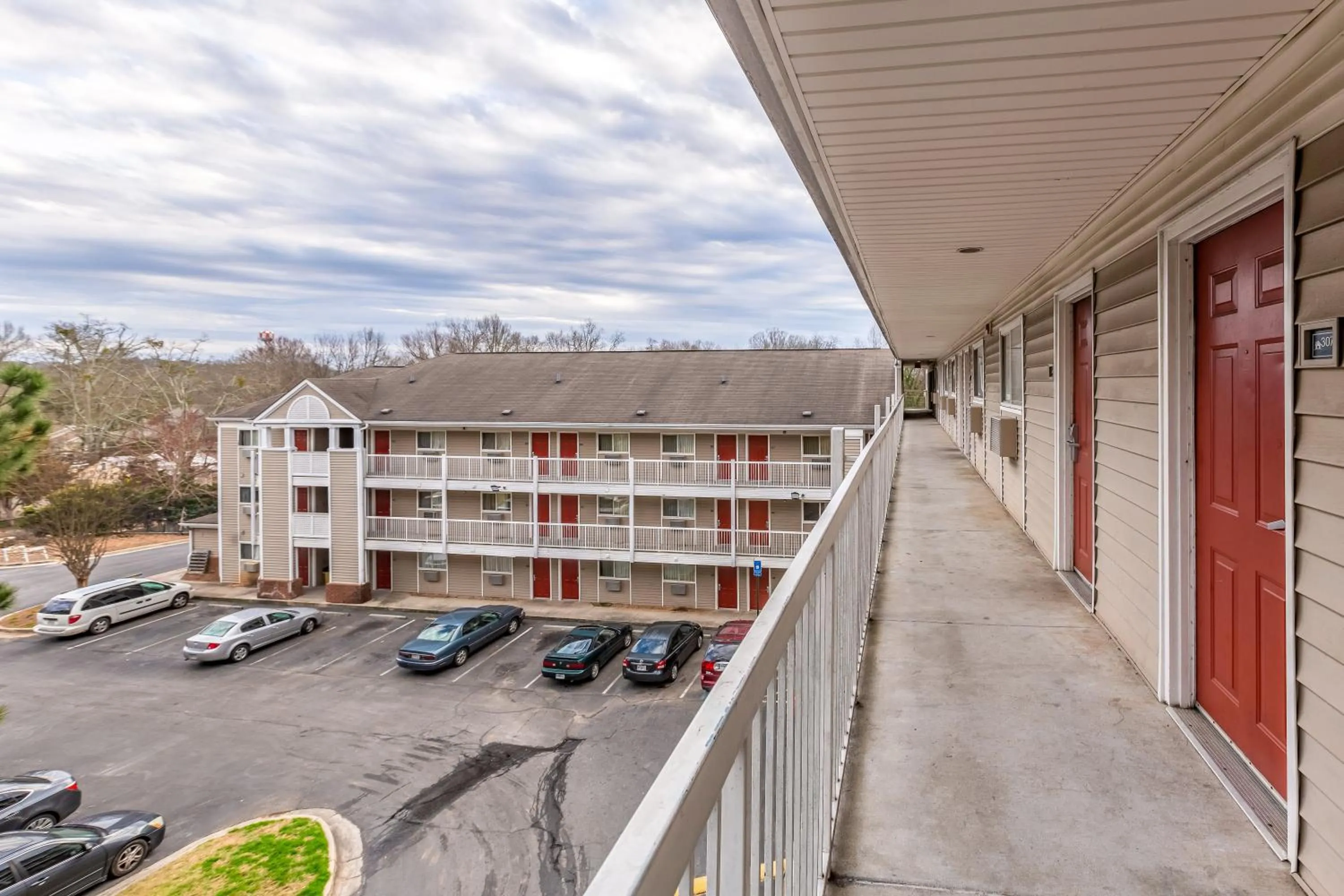 Property building in HomeTowne Studios by Red Roof Gainesville, GA