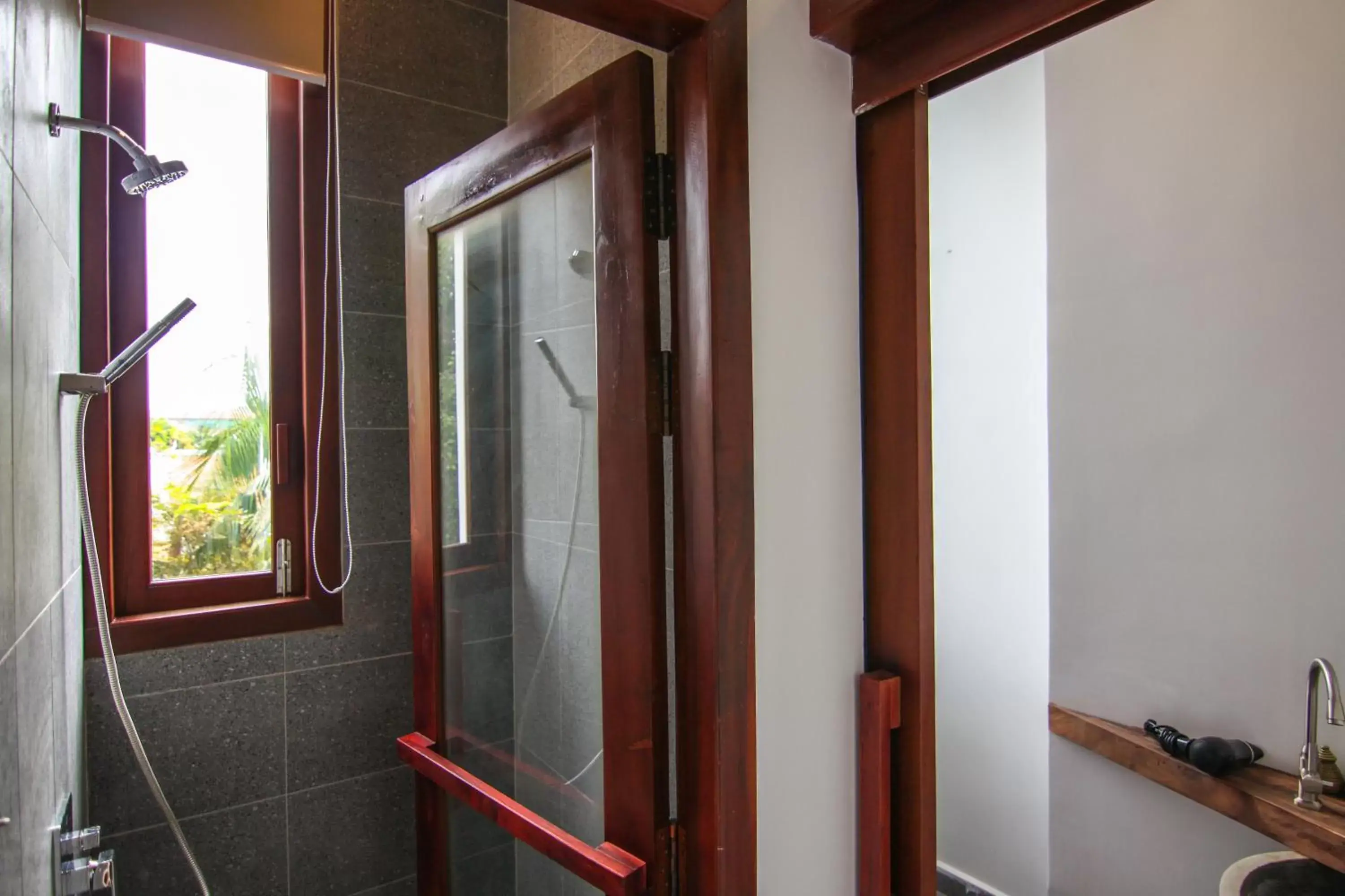 Bathroom in Sarina Hotel & Villa Bathroom in Sarina Hotel & Villa