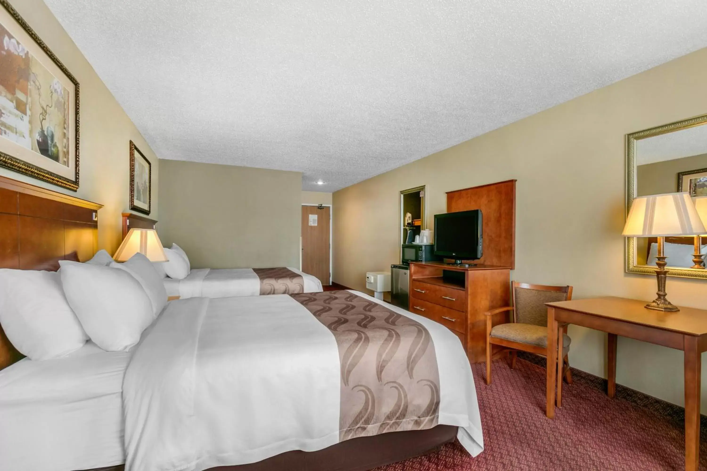 Photo of the whole room, Bed in Quality Inn near Monument Health Rapid City Hospital