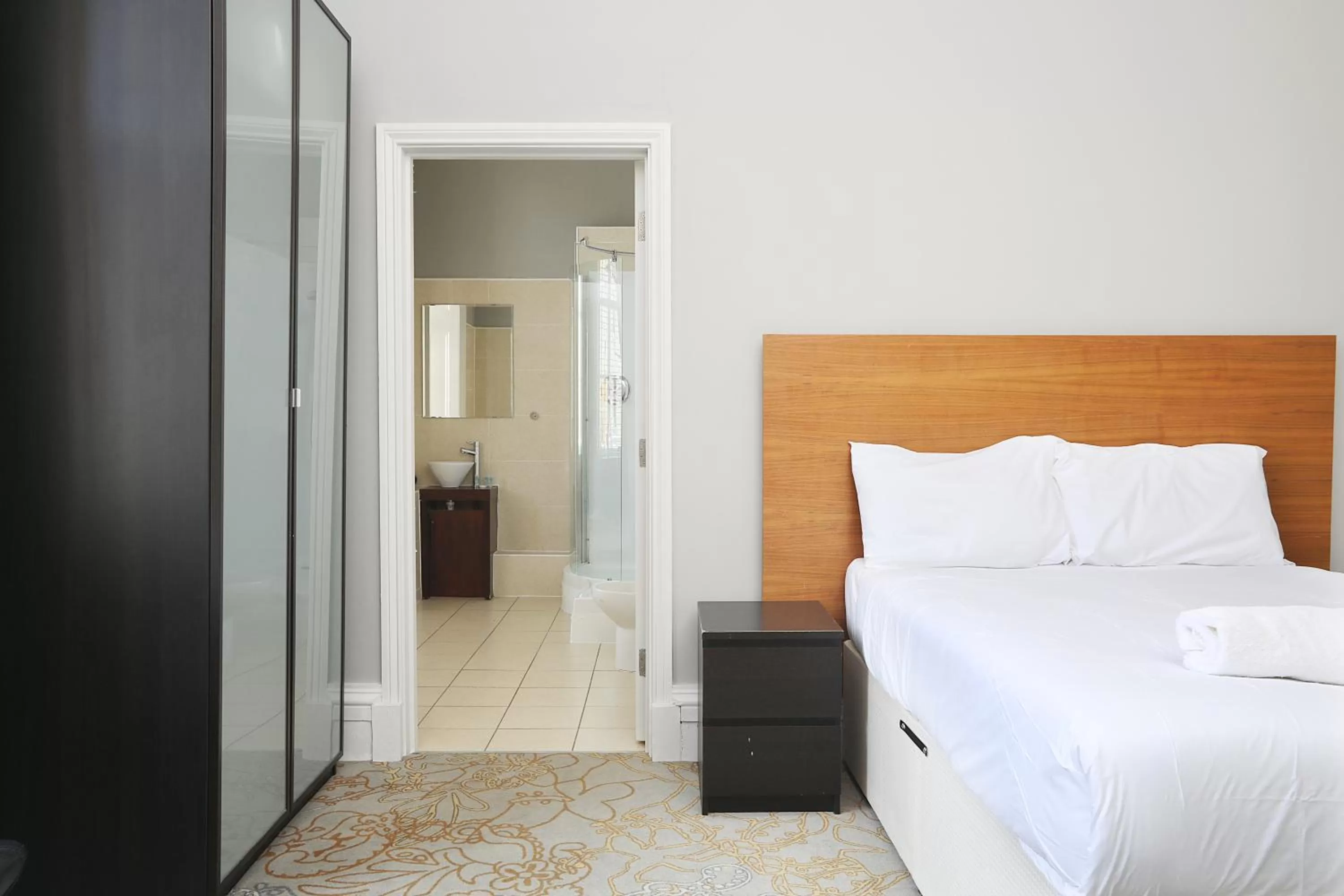 Bed in Cairn Hotel & Apartments