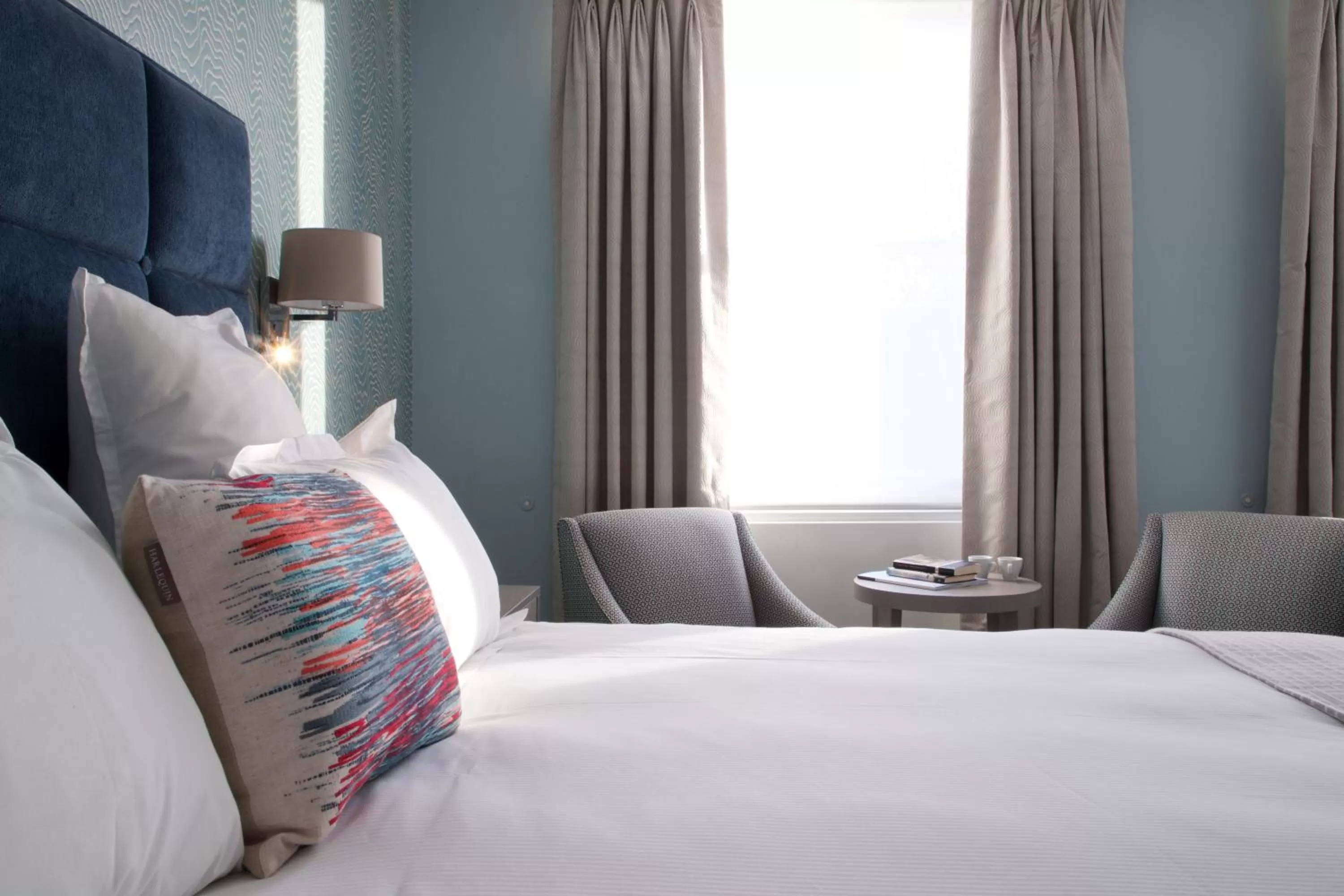 Bed in 54 Queen's Gate Hotel