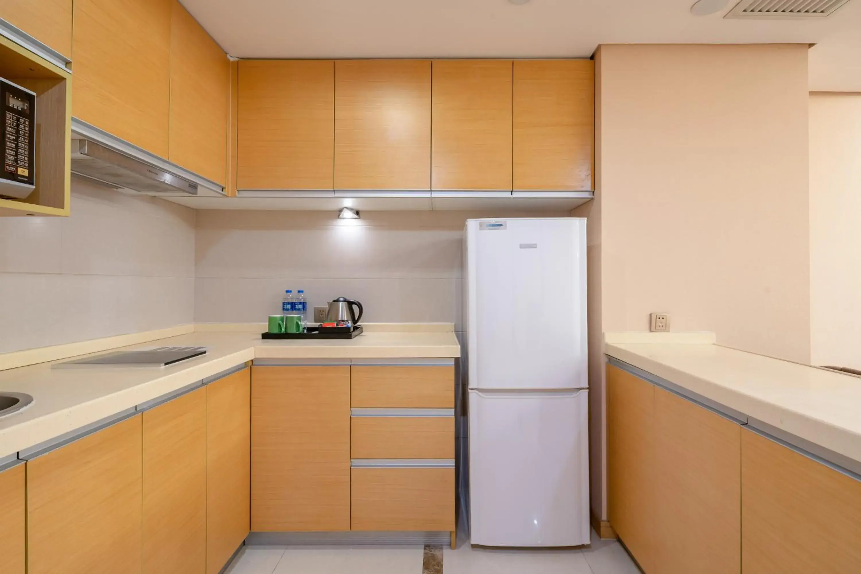 Kitchen or kitchenette, Kitchen/Kitchenette in Regal Plaza Hotel & Residence