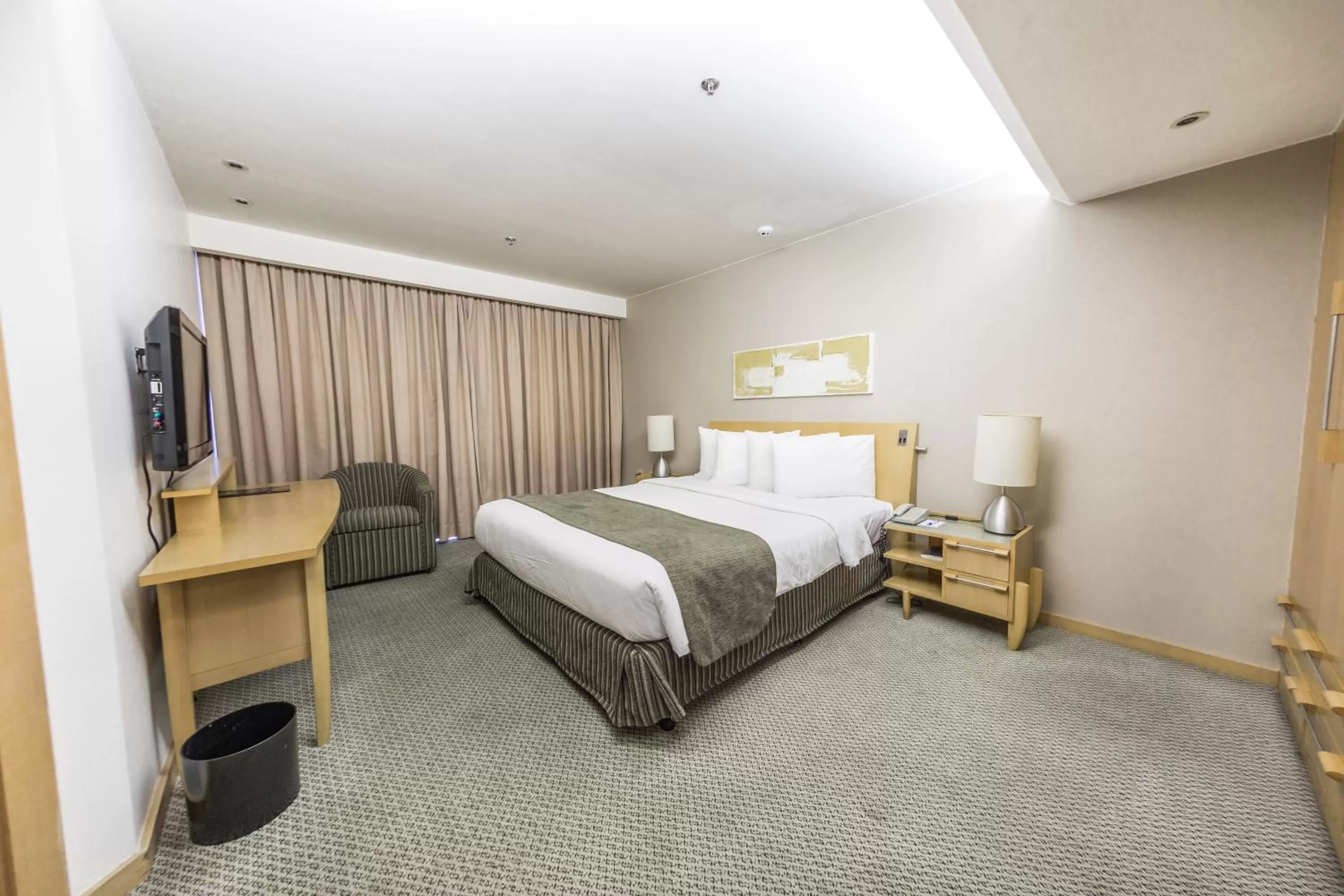 Bed in Grand Bittar Hotel