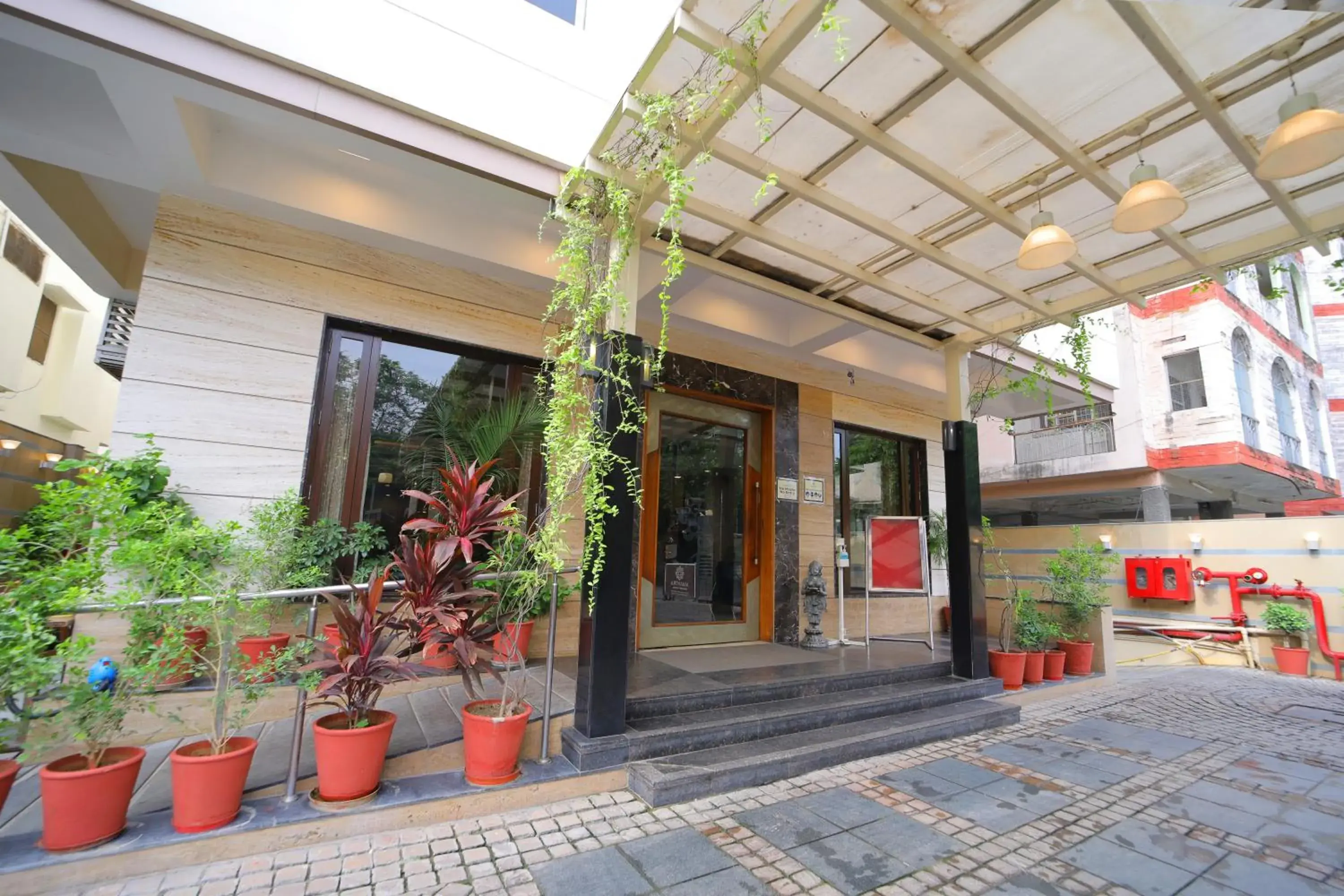 Facade/entrance in Amantra Comfort Hotel