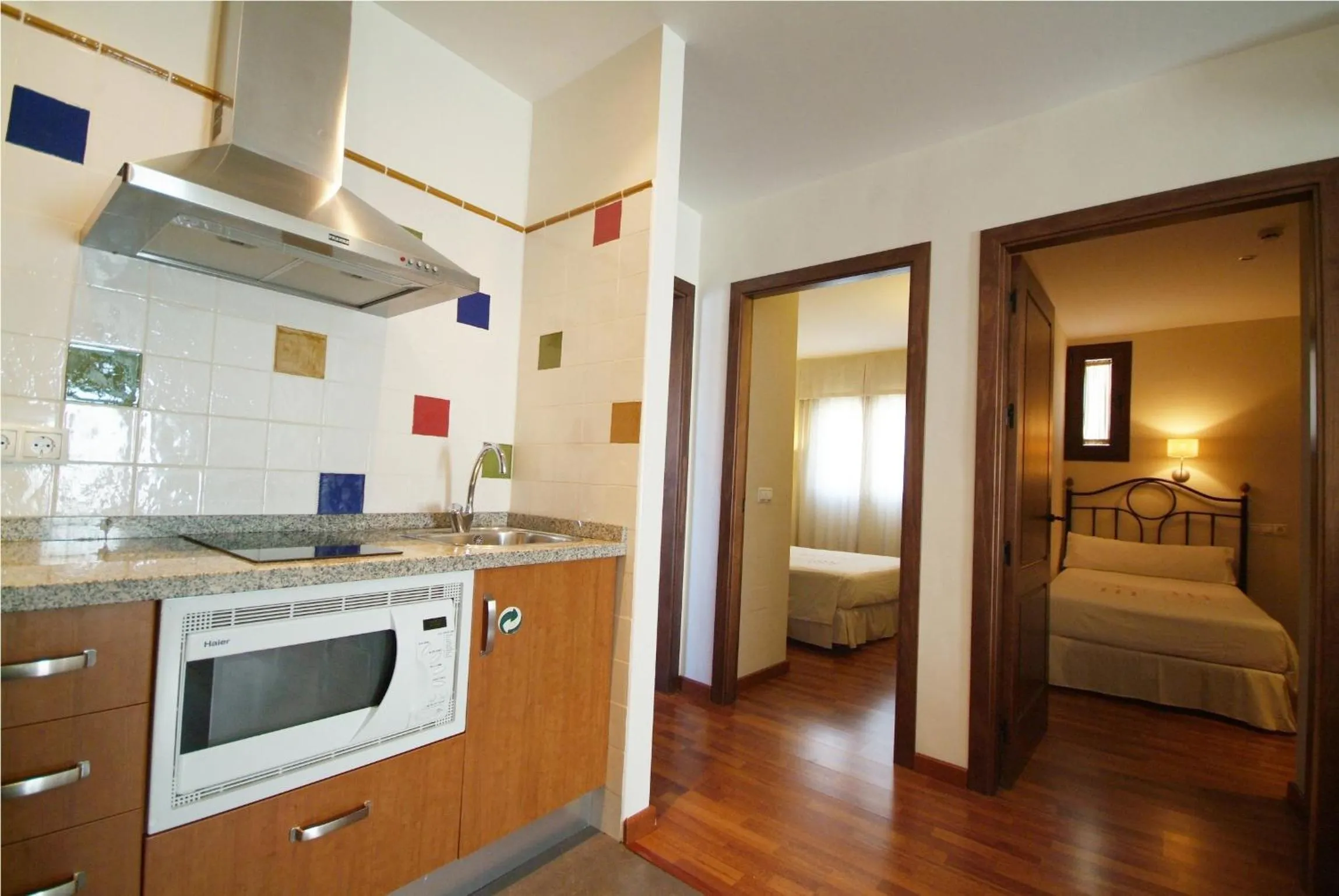 Kitchen or kitchenette, Bed in Apartamentos Ardales