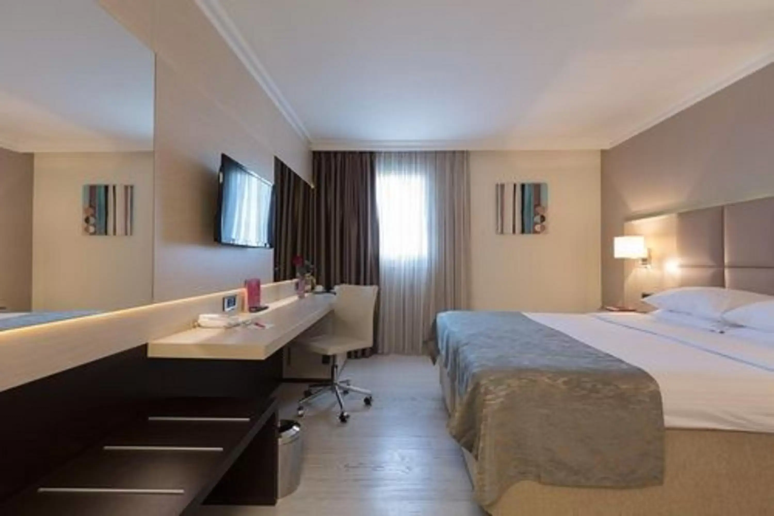 Photo of the whole room, Bed in Ramada by Wyndham Sofia City Center