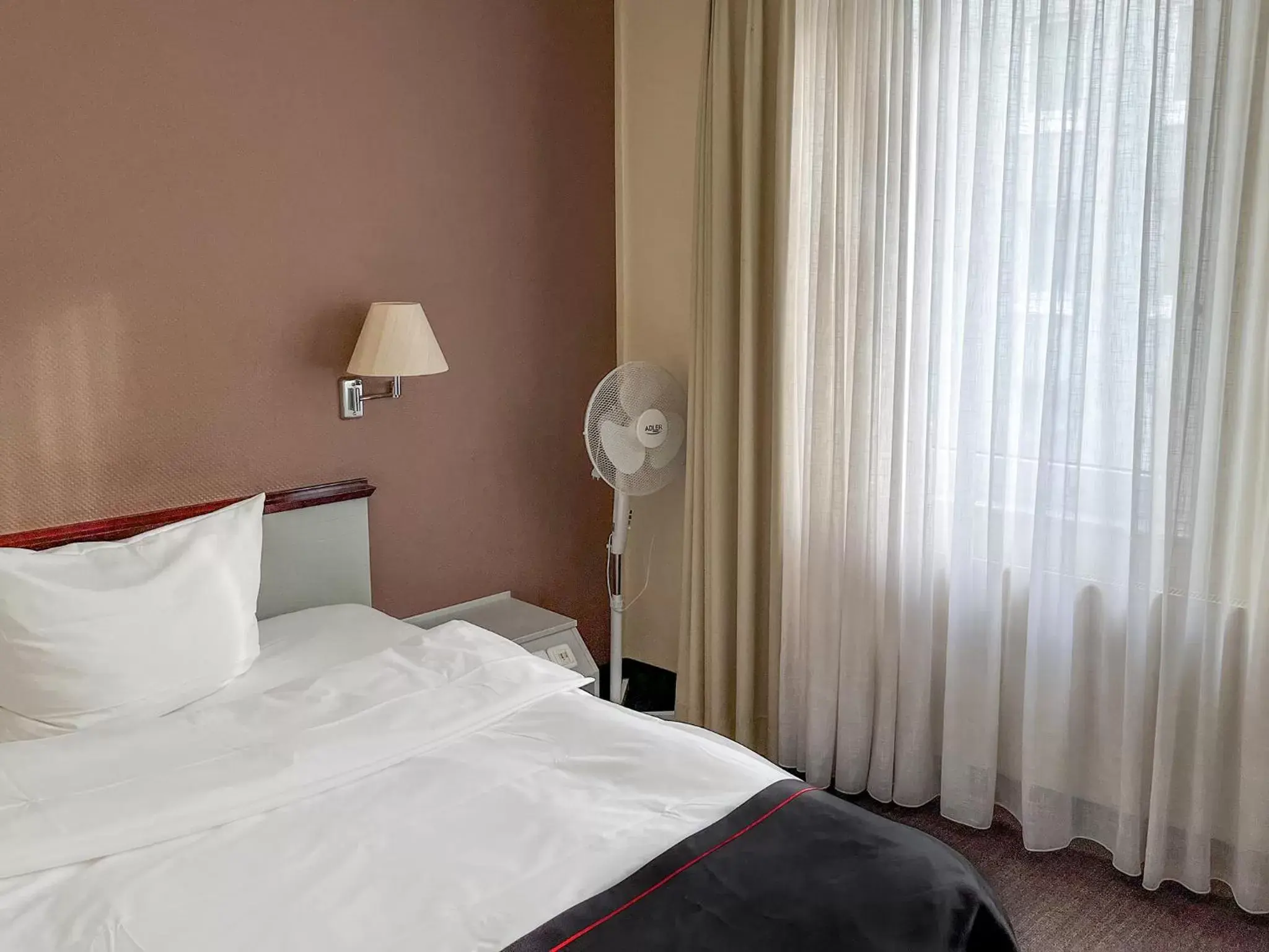 Photo of the whole room, Bed in DORMERO Hotel Dessau-Roßlau