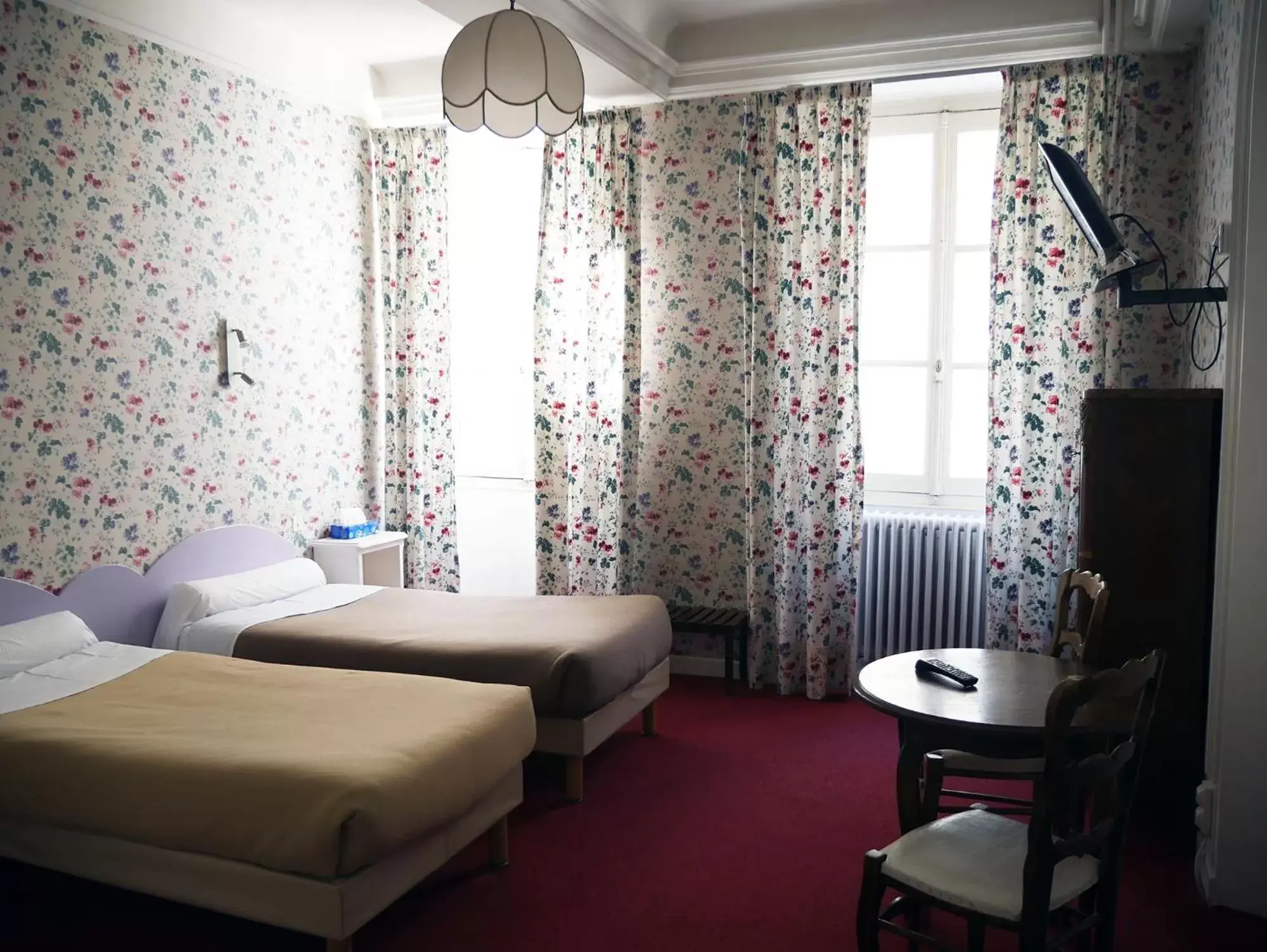Bed in Hotel Saint Jean