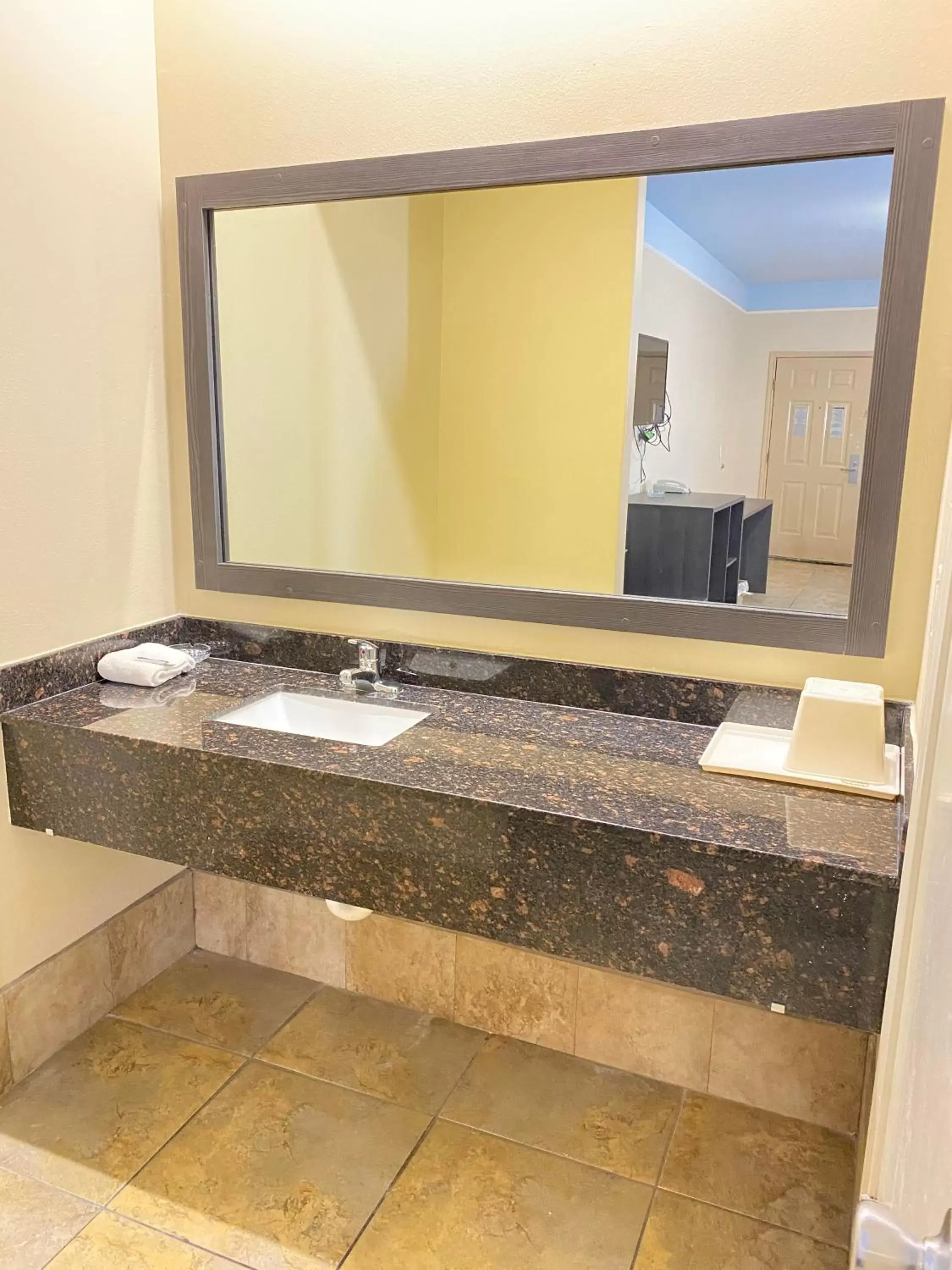 Bathroom in Texas Inn & Suites McAllen at La Plaza Mall and Airport
