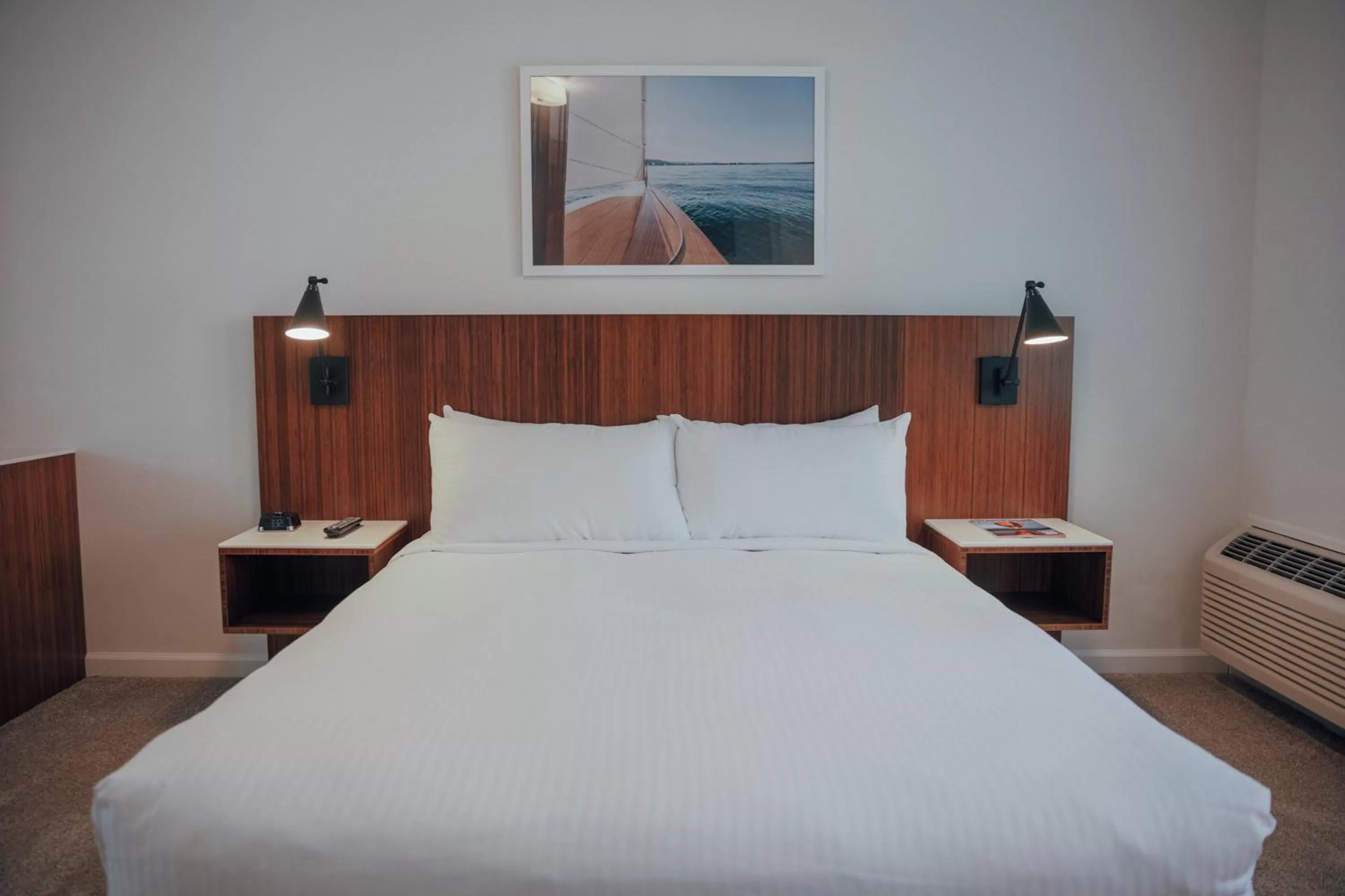 Bed in Skaneateles Suites Boutique Hotel