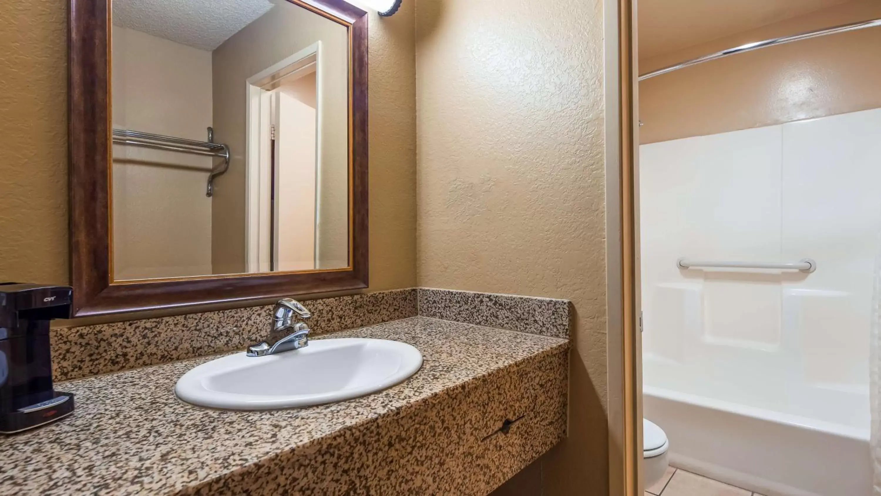 Bathroom in SureStay Plus Hotel by Best Western San Bernardino South