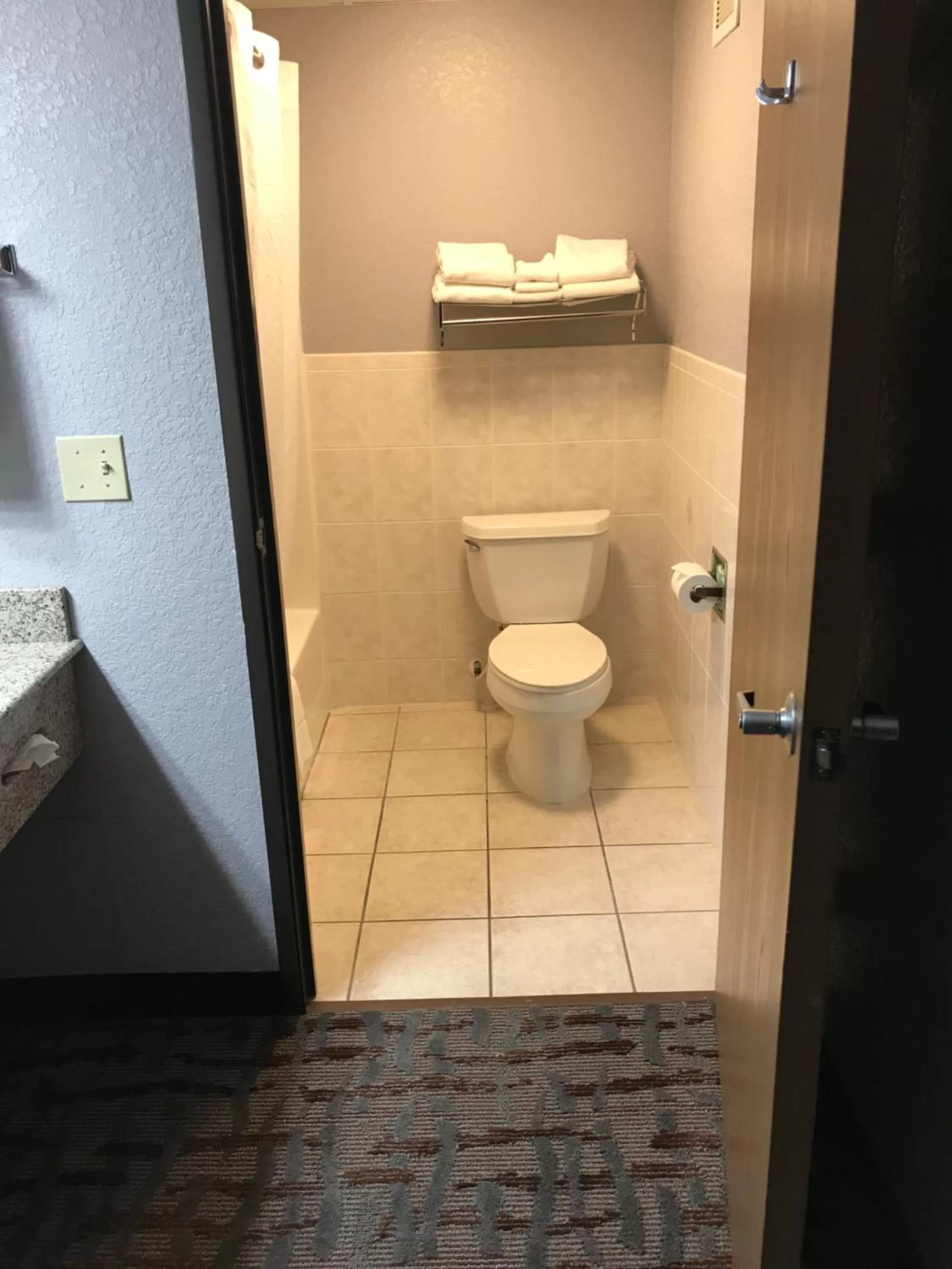 Bathroom in AmericInn by Wyndham Ankeny/Des Moines