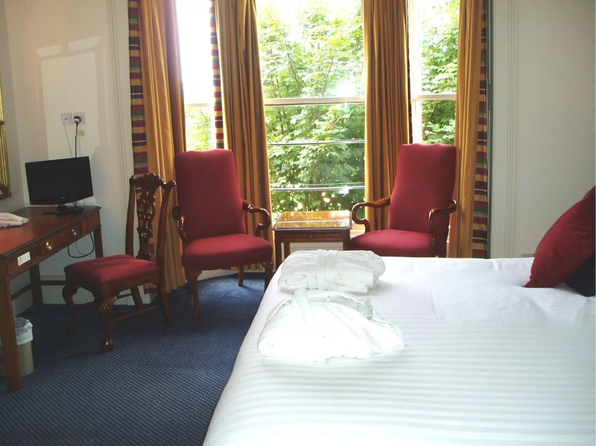 Bedroom in The Golf Hotel