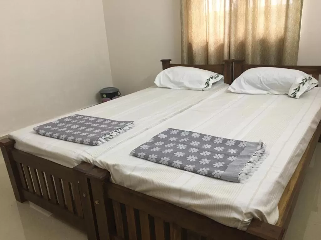 Bedroom, Bed in Shantham Service Apartments