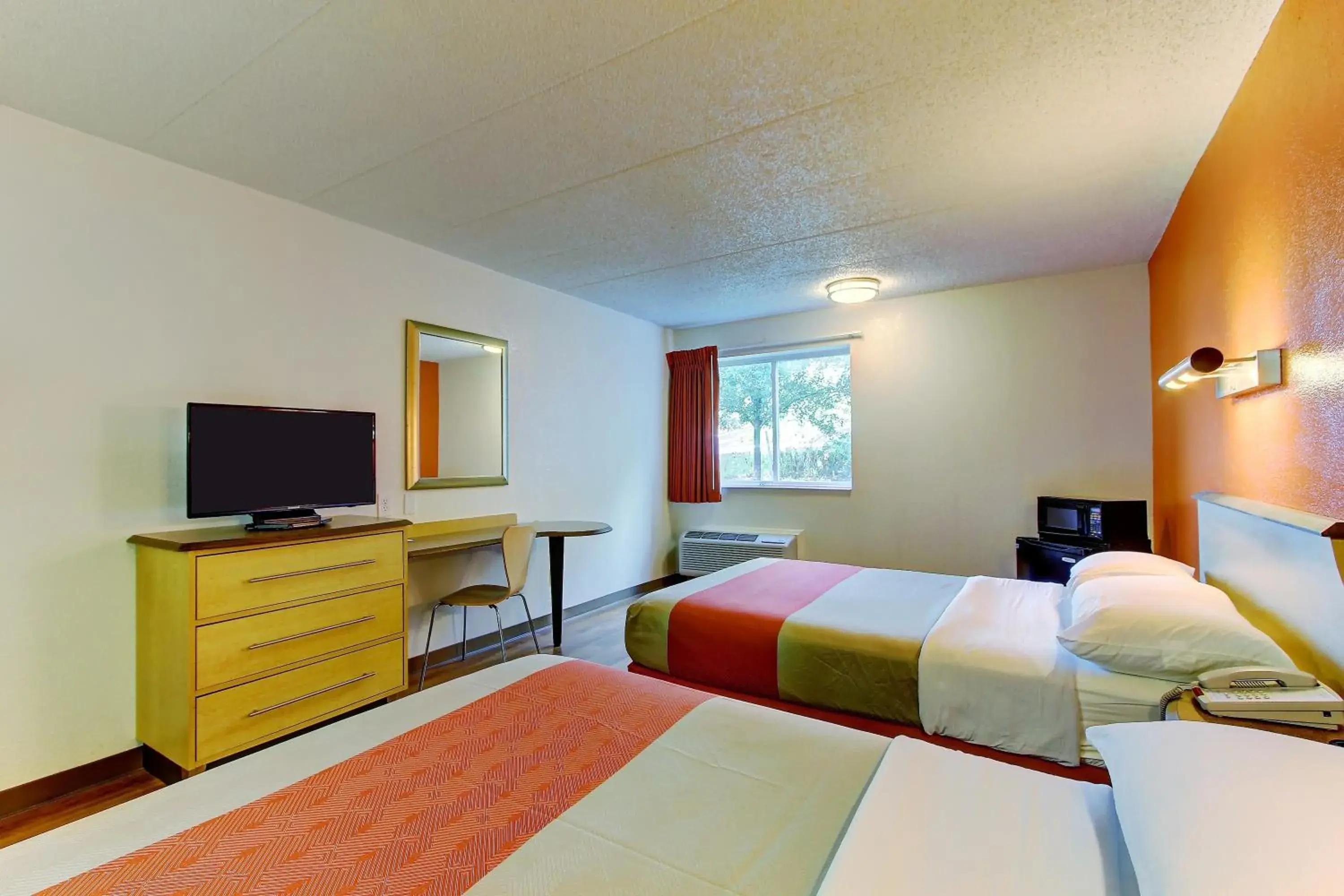Seating area, Bed in Motel 6-York, PA - North