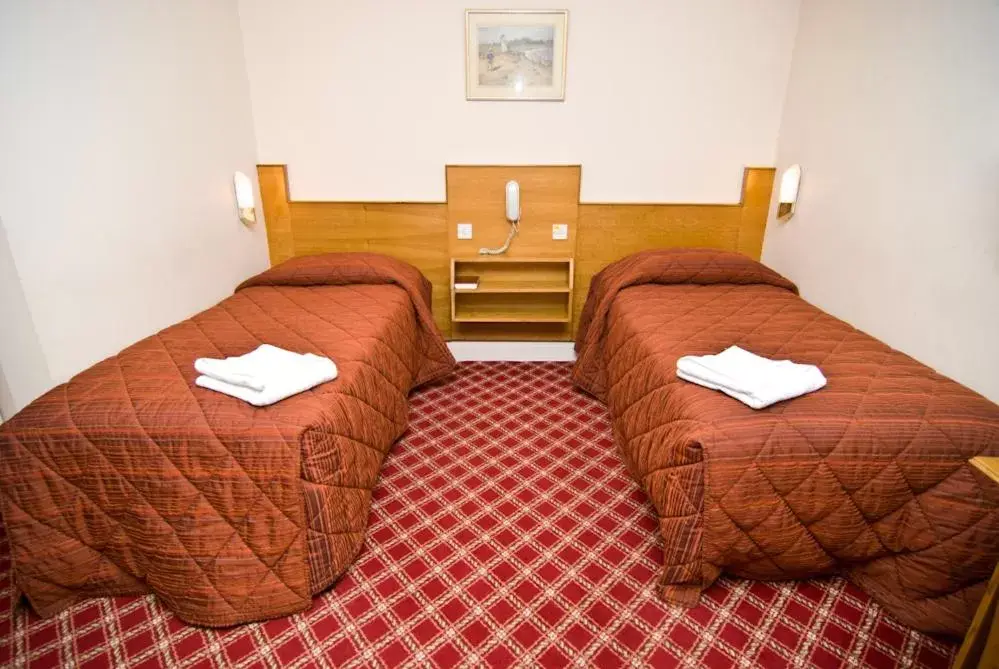 Bed in Alexandra Hotel