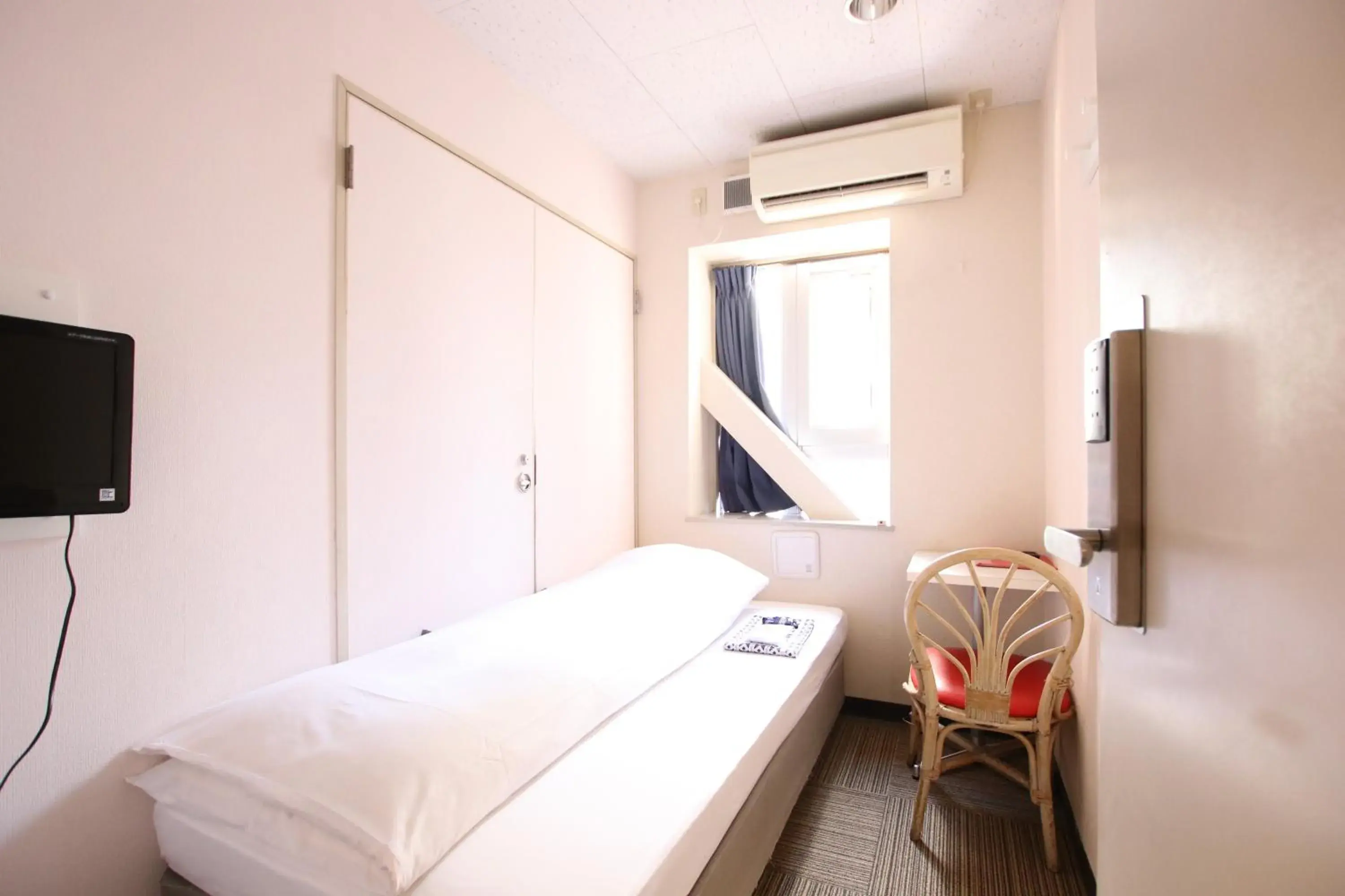 Photo of the whole room, Bed in Sakura Hotel Jimbocho
