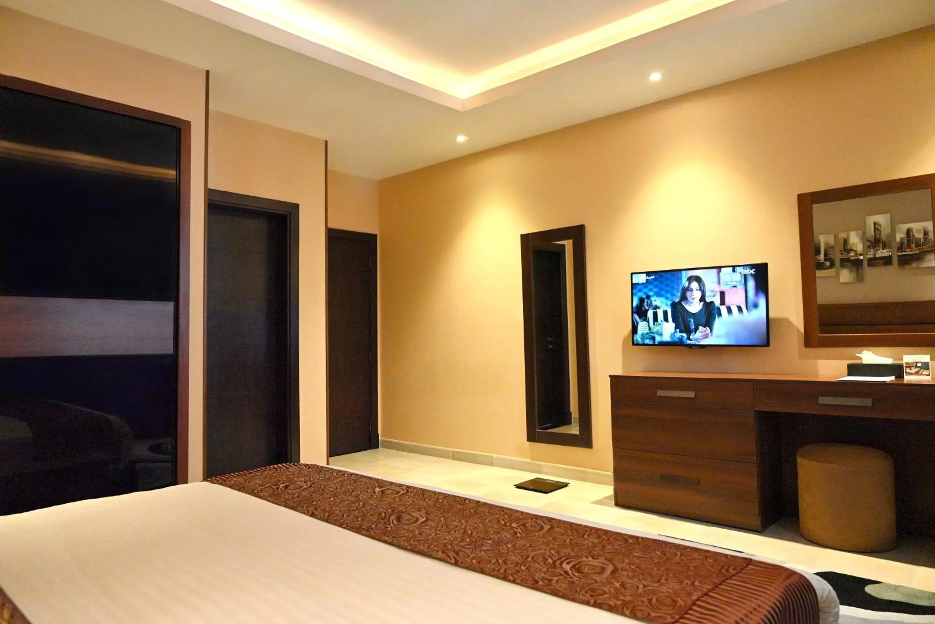 Bedroom, TV/Entertainment Center in Q Suites Jeddah by EWA - Managed by HMH