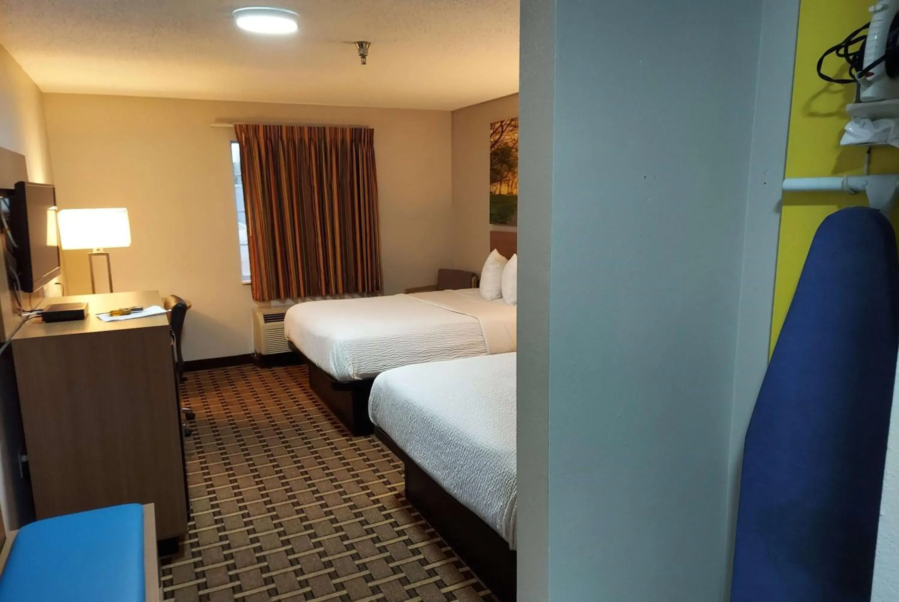 Photo of the whole room, Bed in Days Inn & Suites by Wyndham Huntsville