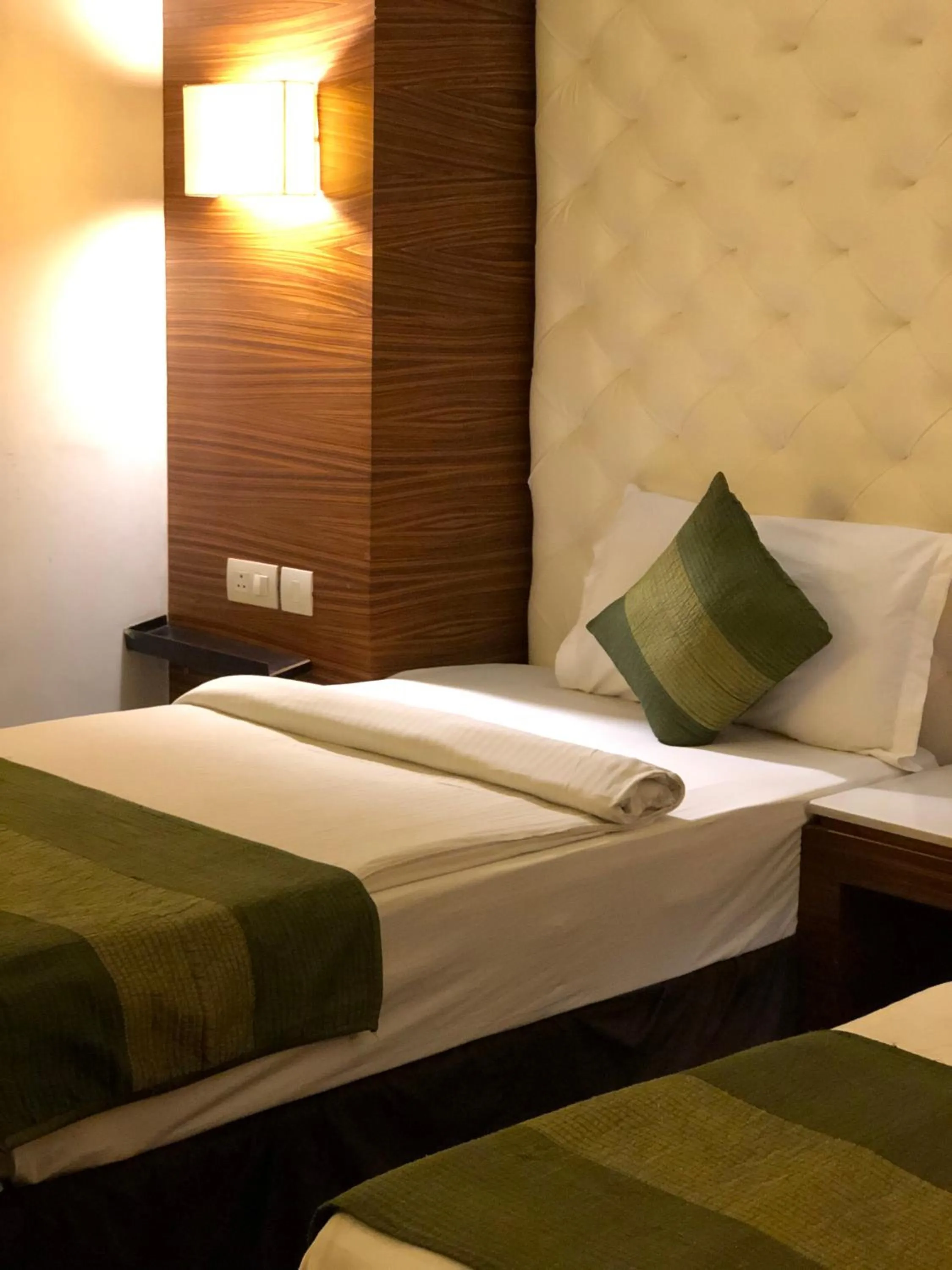 Bed in Hotel Ivory 32