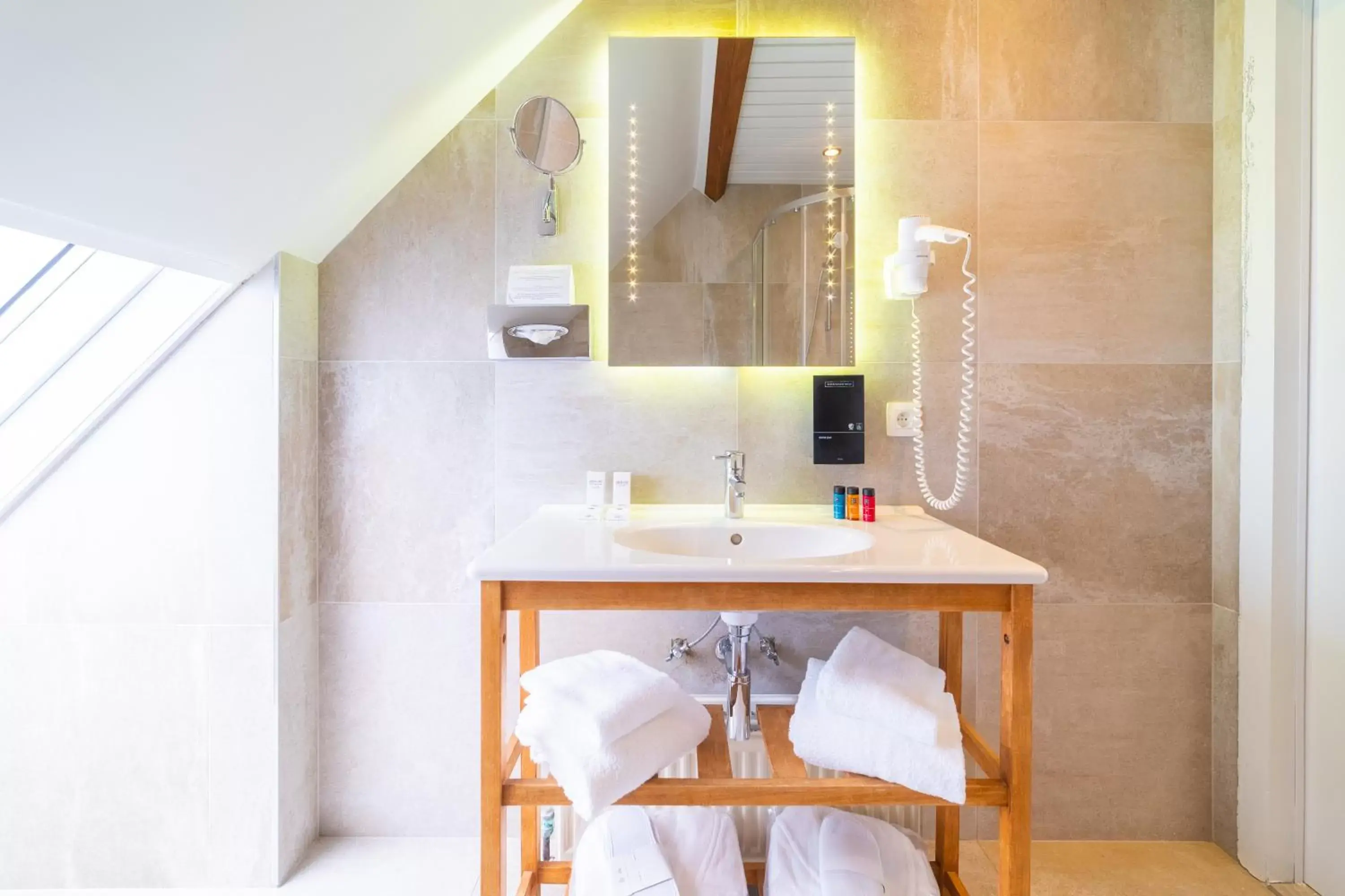 Bathroom in Grand Hotel Normandy by CW Hotel Collection