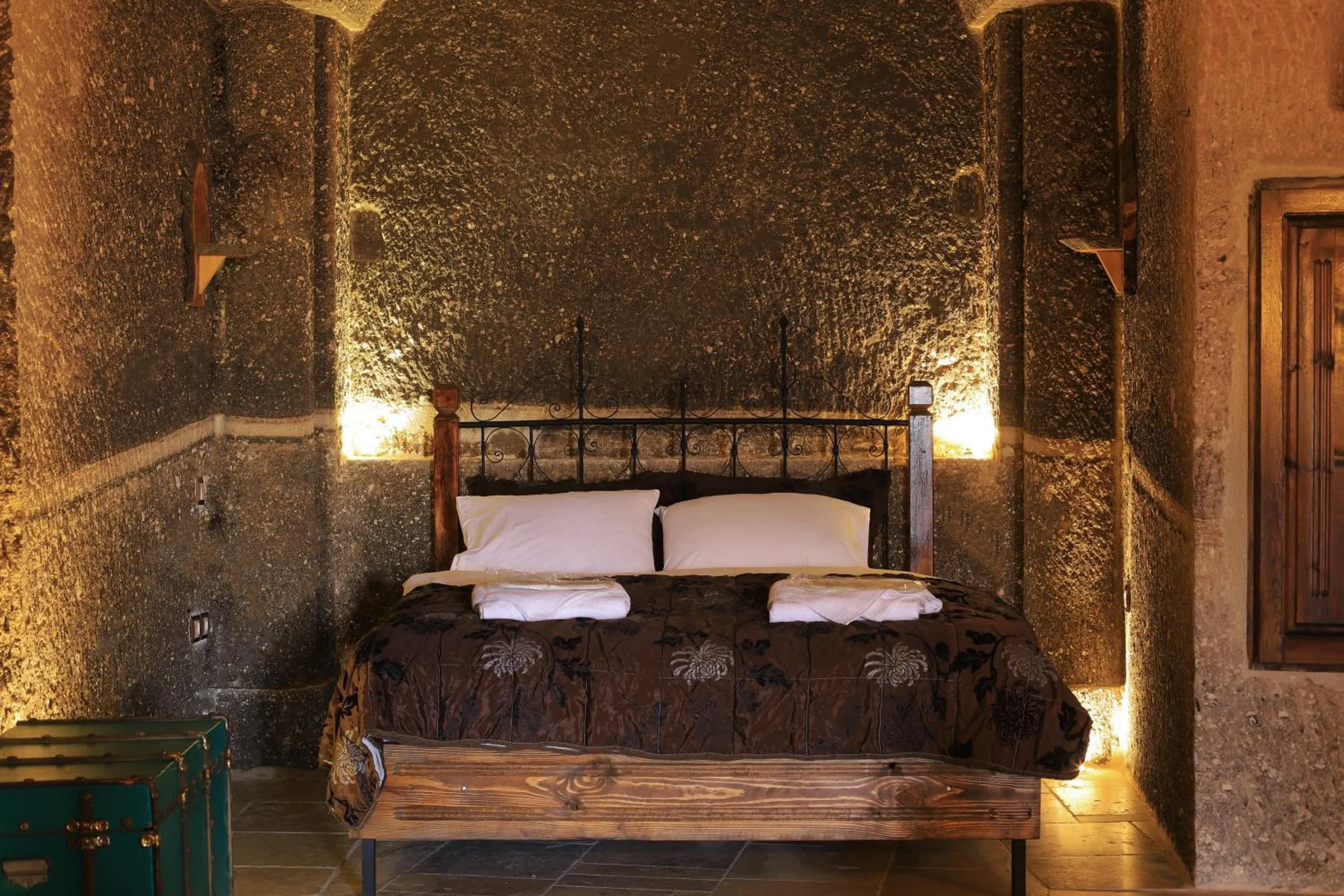 Bed in Antique Terrace Cave Suites