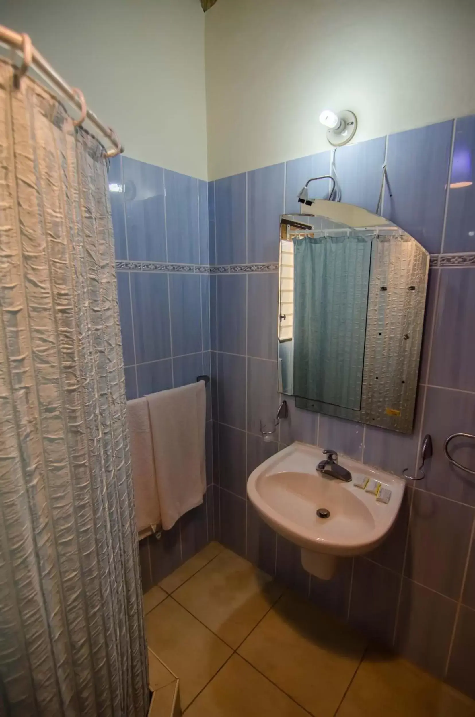 Bathroom in D'Piero Hotel