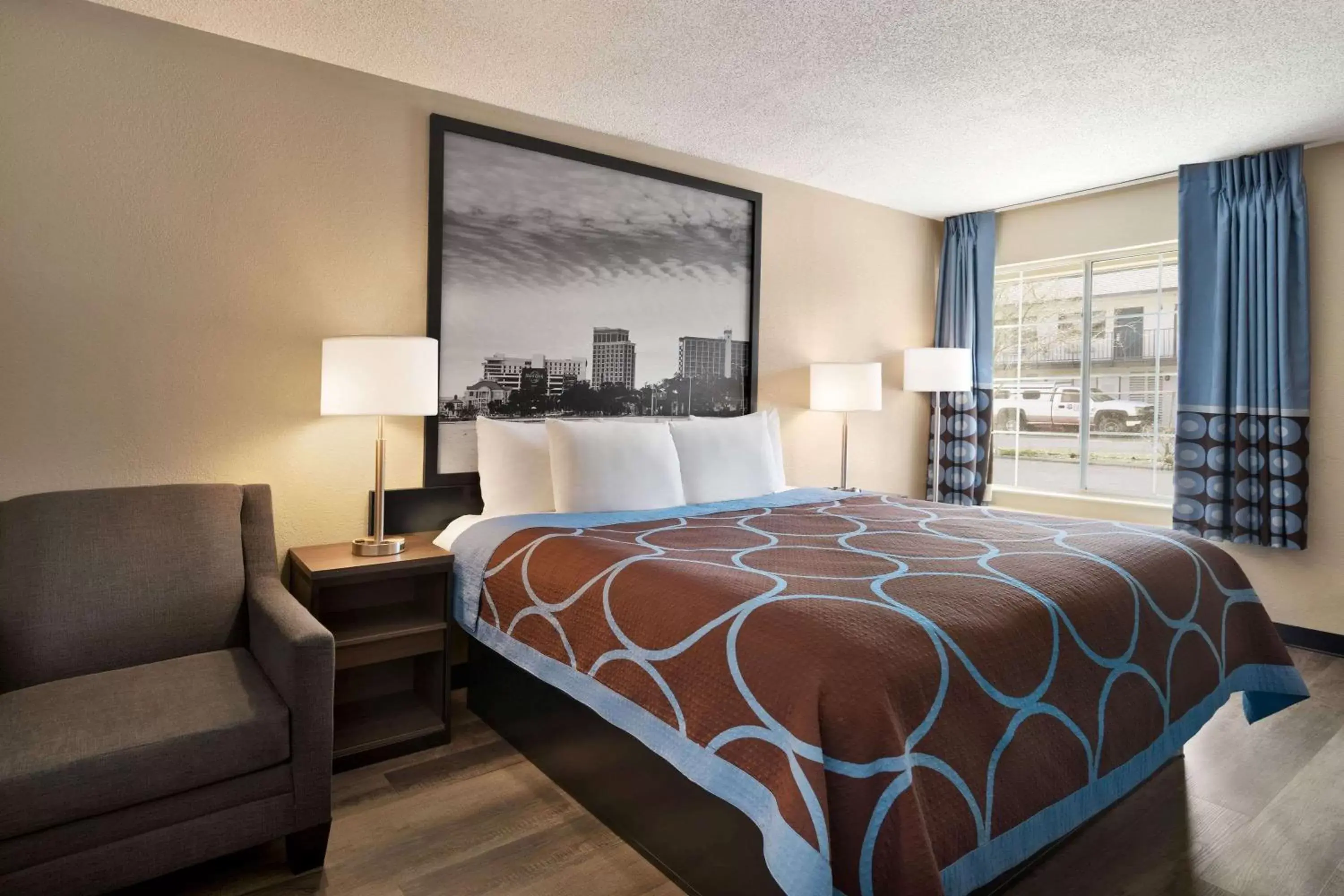 Bedroom, Bed in Super 8 by Wyndham Gulfport Near Biloxi